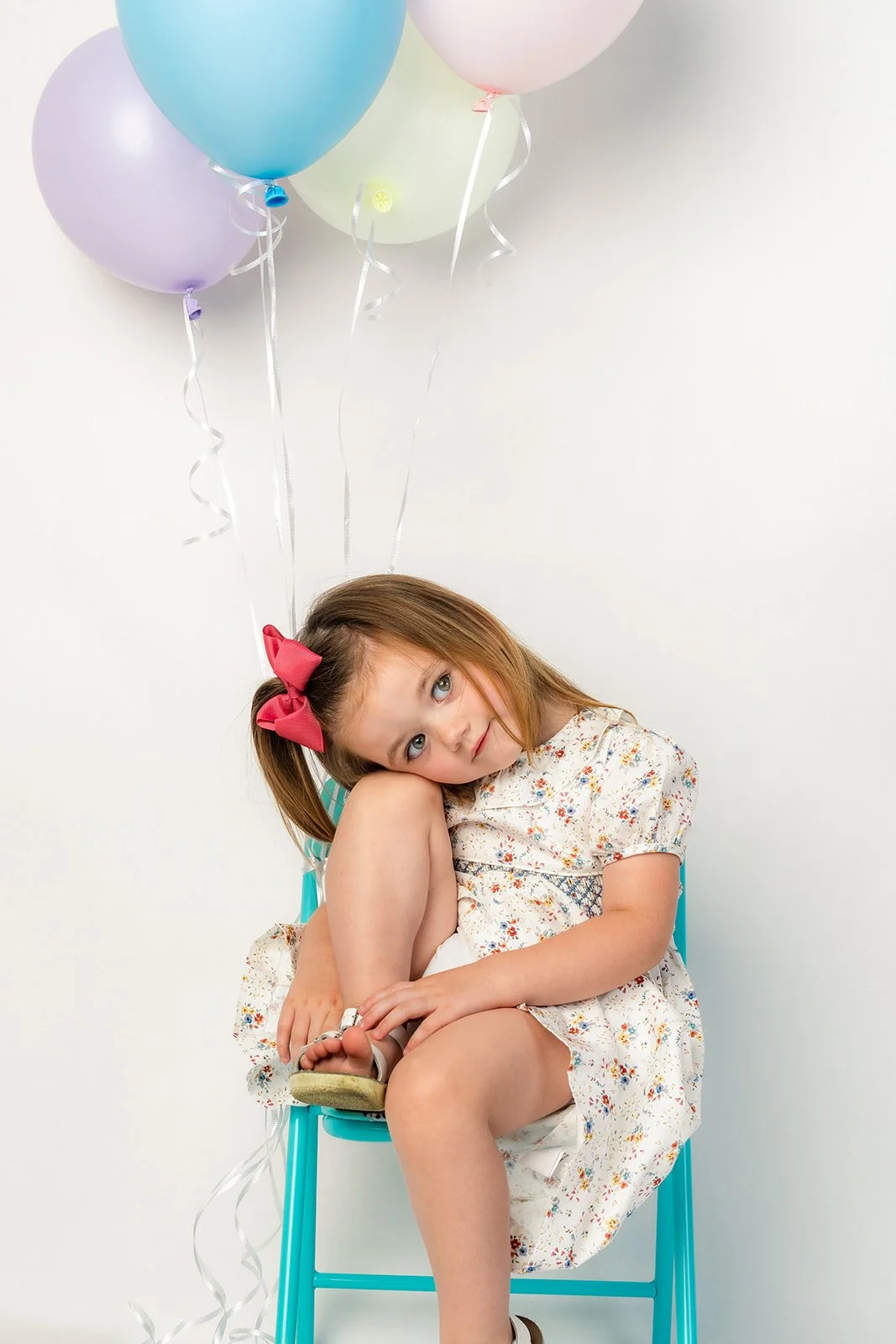 child birthday portrait with balloons in clarksville, tn
