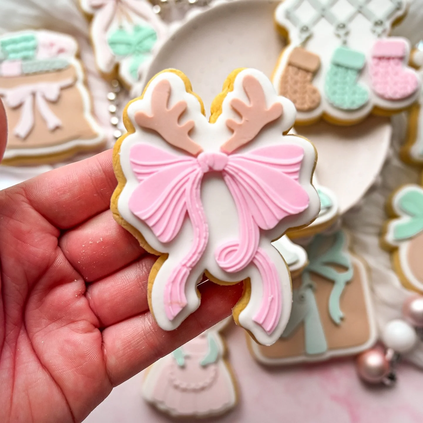 Santa called &mdash; he wants these left out this year 🎅🏼💖 

Officially in my pastel Christmas era 🎄
Christmas cookies available to order now! 🫱🏻&zwj;🫲🏼 

All designs are @acookieortwo_ new Christmas range! 
And let me tell you, they were a d