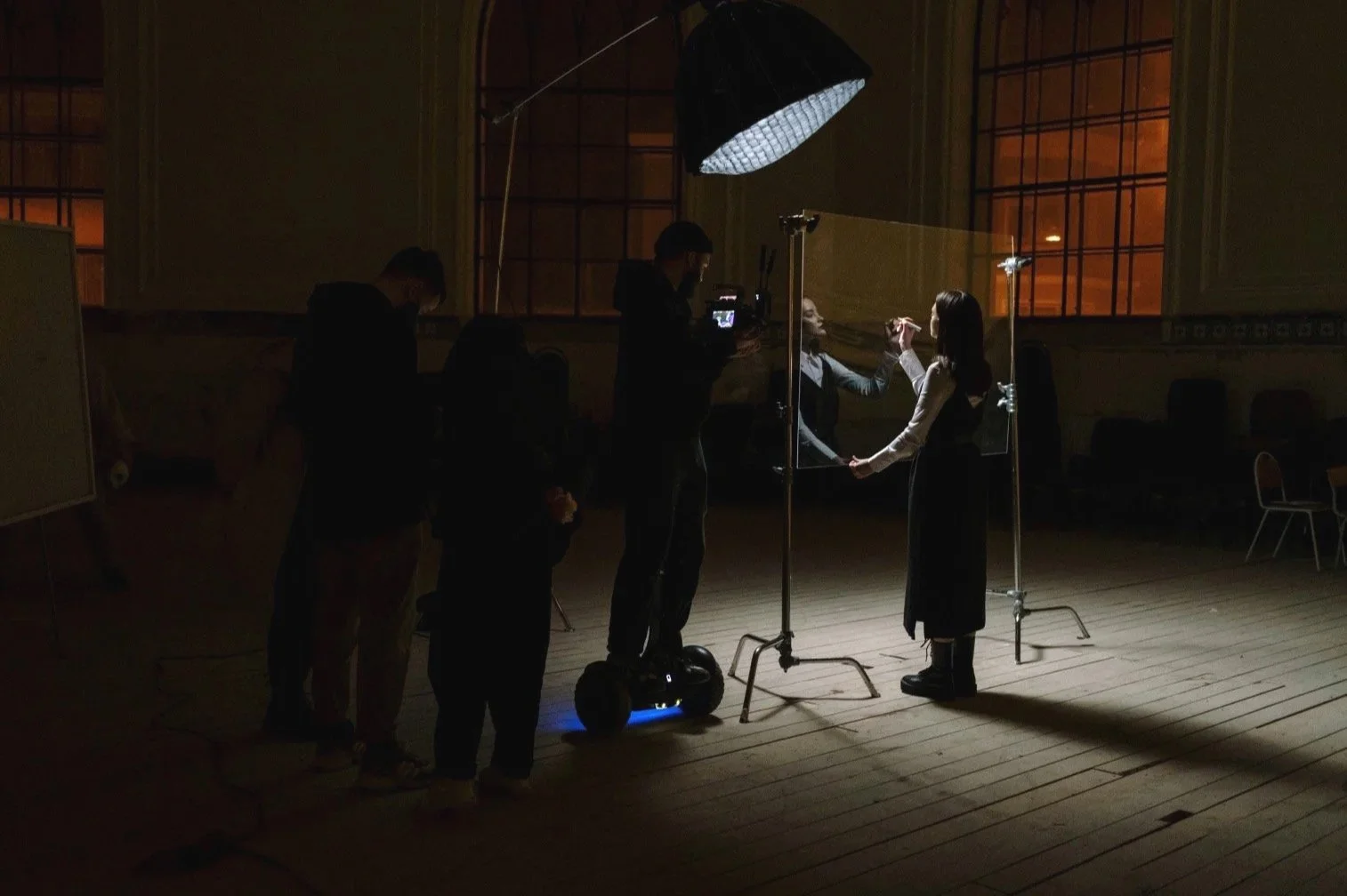A-video-production-shoot-in-a-dimly-lit-studio-with-lighting-equipment-for-Soulful-Production-Video-Production-Company-Portland-Oregon