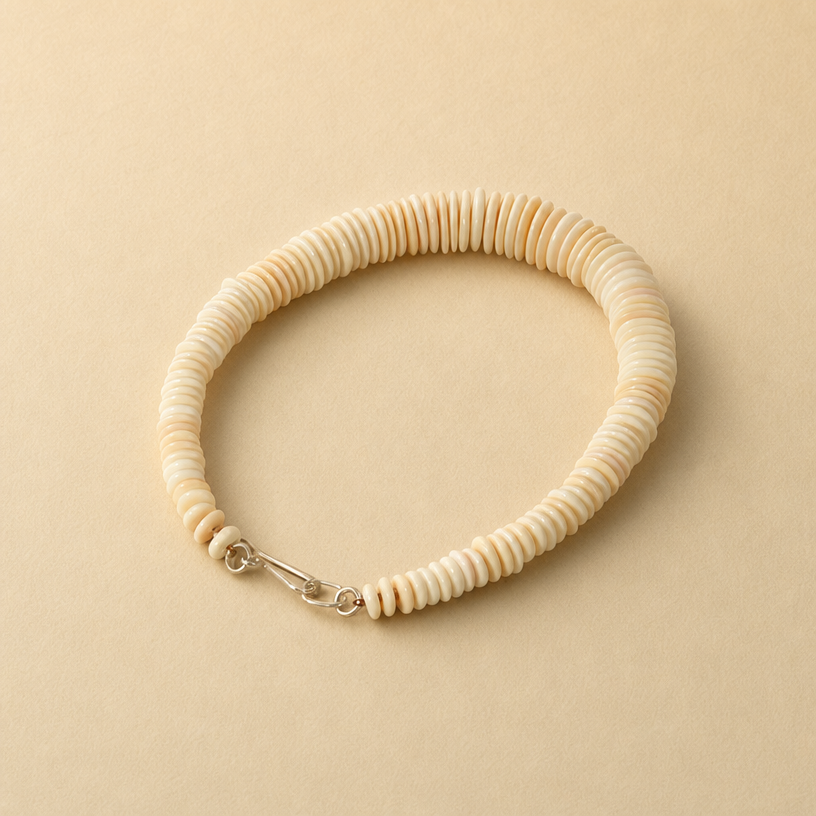 conch shell necklace back.png