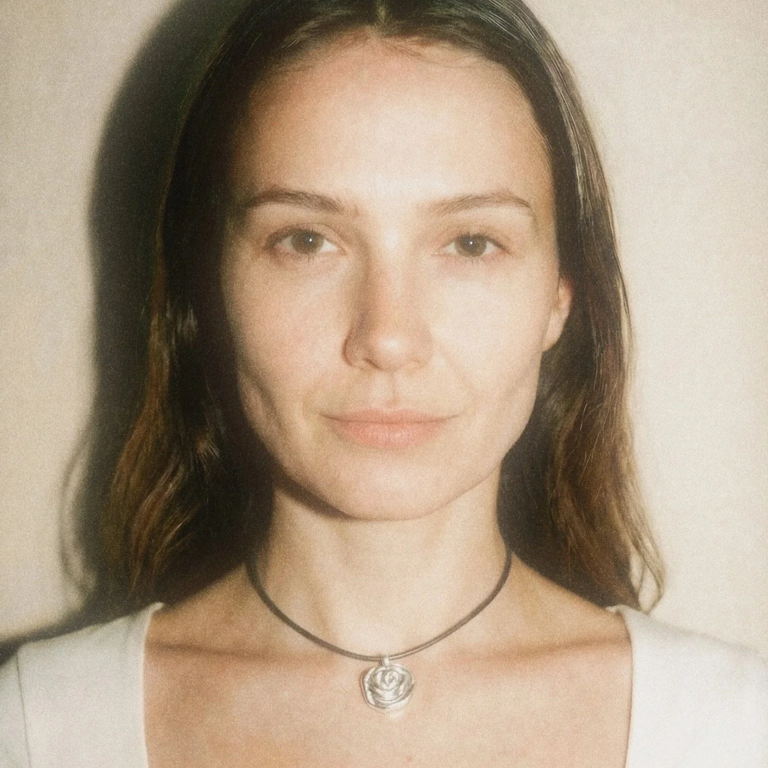 silver rose on cord necklace