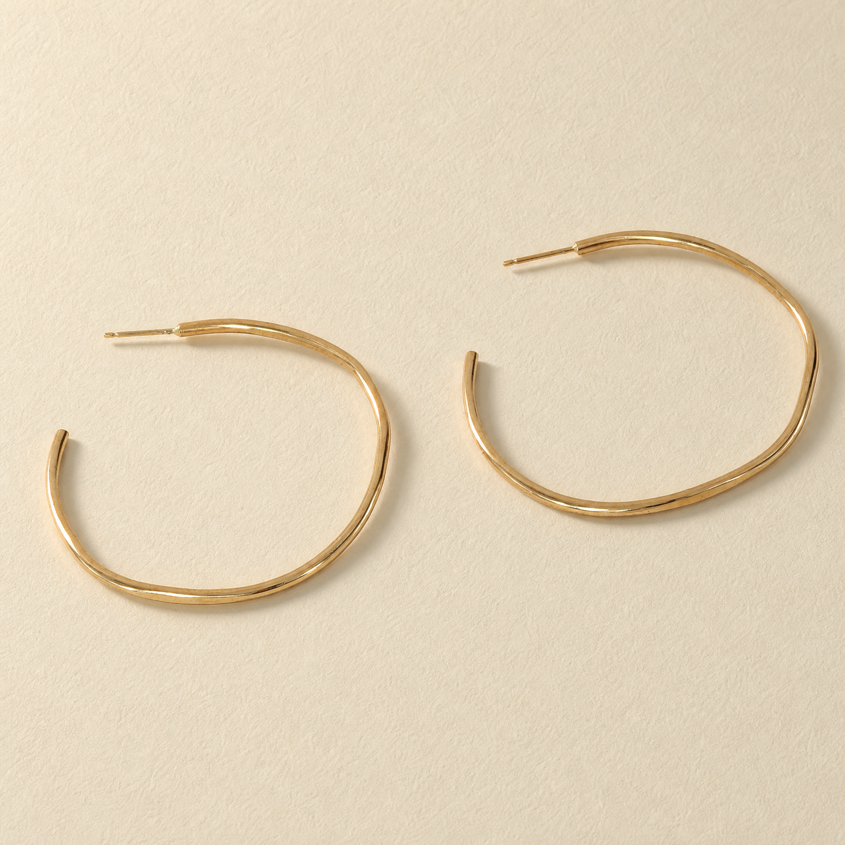 hammered oval hoops gold.png