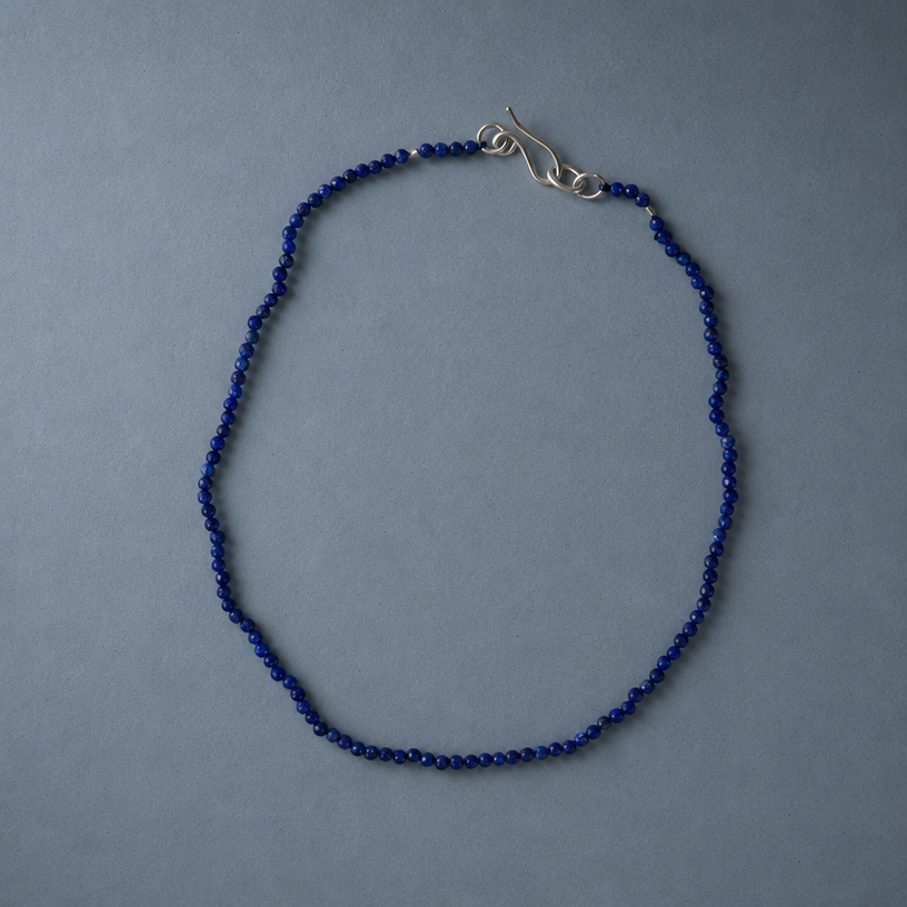 mini lapis beaded necklace top.png