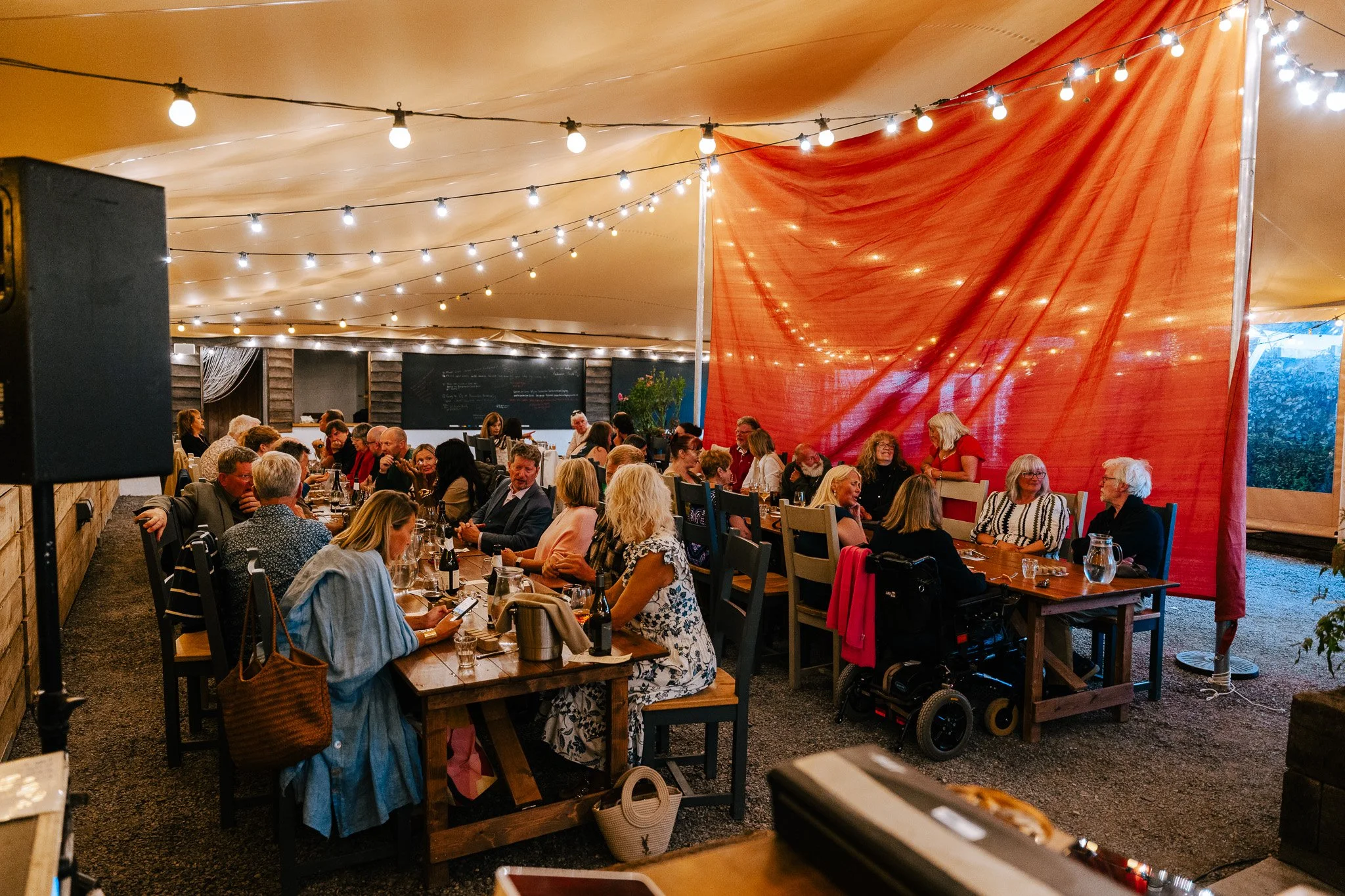 Guests dining under the courtyard canopy at Y Marram's 2026 Guest Chef Series.