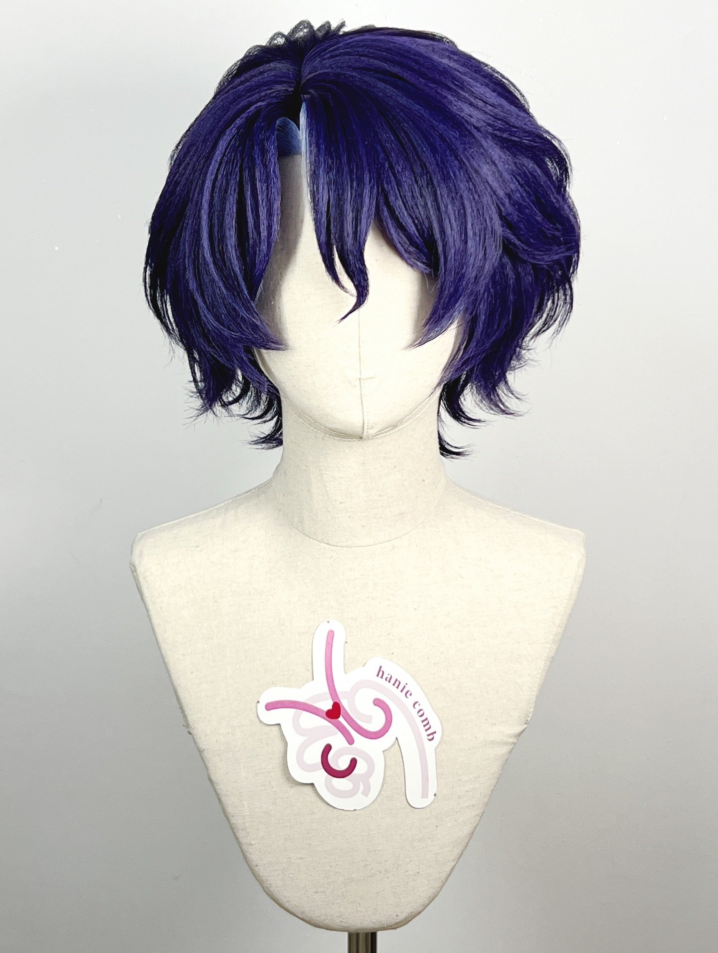 Dr Ratio from Honkai: Star Rail

Styled from a character base wig, we removed the original hairline weft pieces and crafted glue hairline. Styled with a natural look with lots of layered textures.

Join our broadcast channel to see more behind the sc