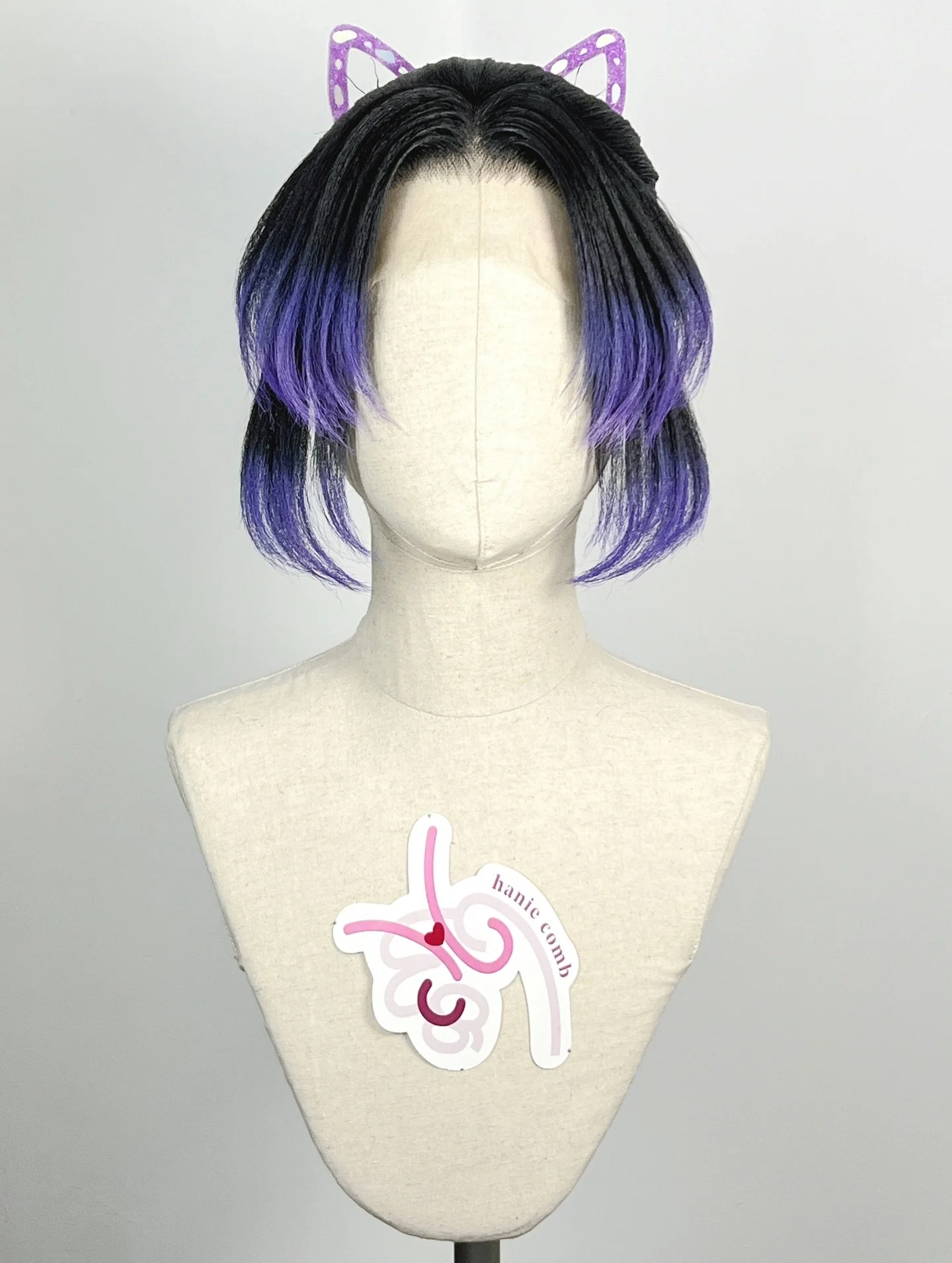 Kochou Shinobu from Demon Slayer

Updo styled with a lacefront wig base, then airbrushed gradient for the purple tips