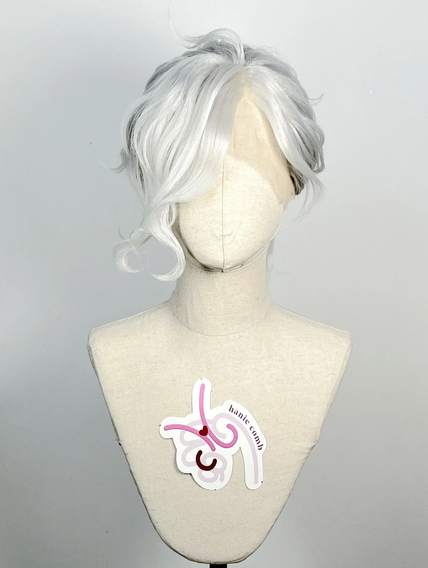Dantes from Fate Grand Order

Started off with a lace front base wig, gave it a high layer haircut then styled with wavy curls and tied into a ponytail.