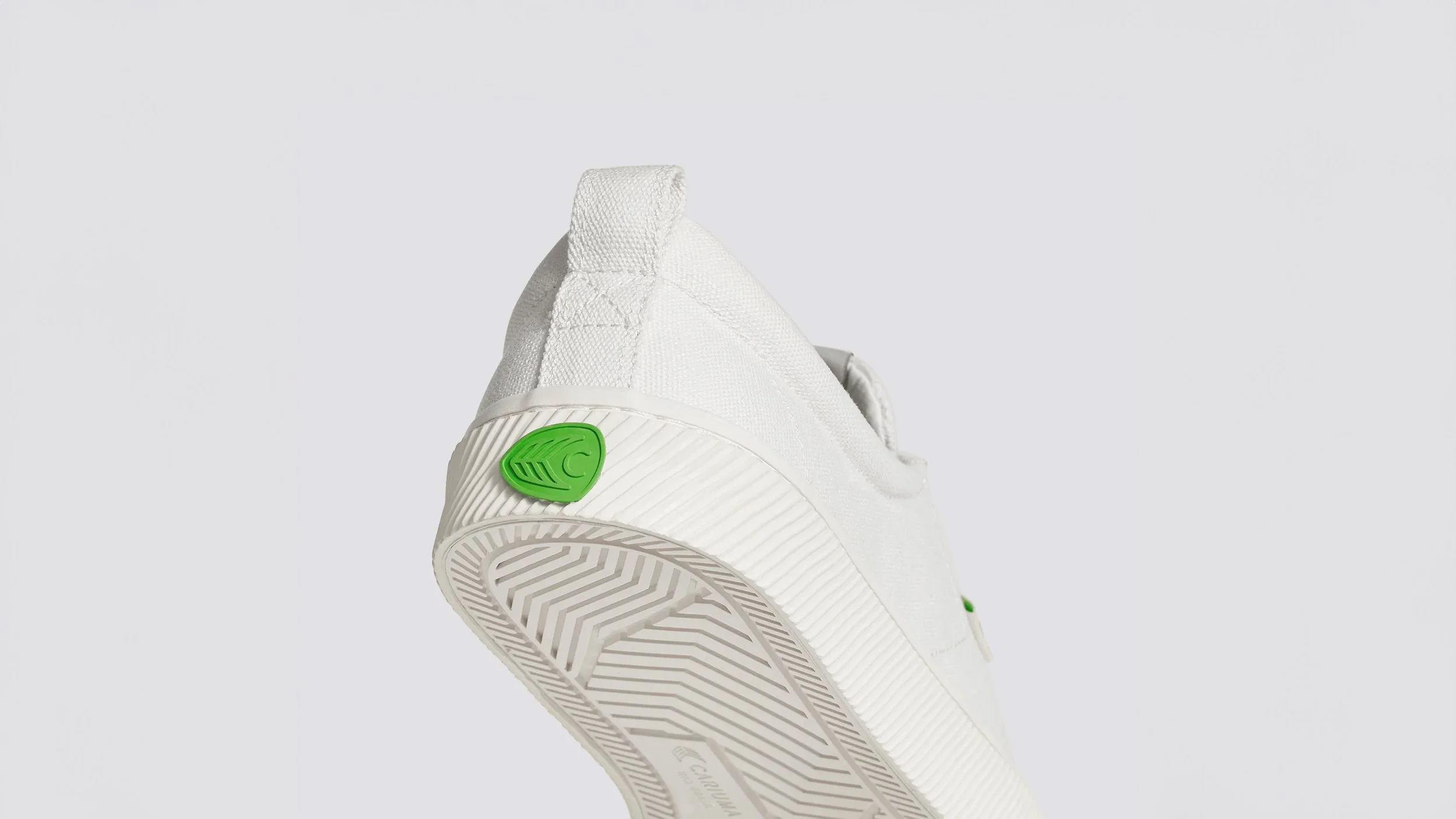 3 oca-low-off-white-canvas-sneaker.slideshow1 (2) copy.jpg
