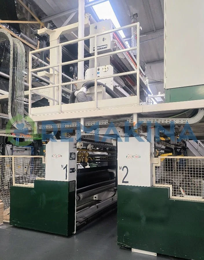 Línea de coextrusión Macchi de 3 capas con bobinadora doble espalda con espalda