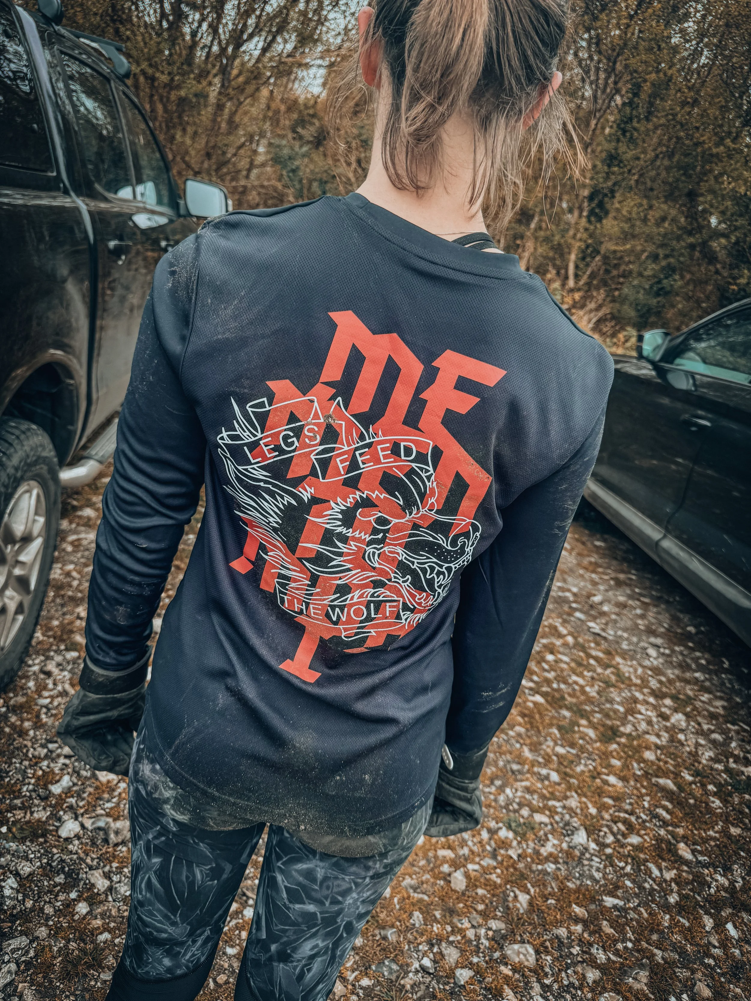 Ladies LS Legs Feed the Wolf Tech-T