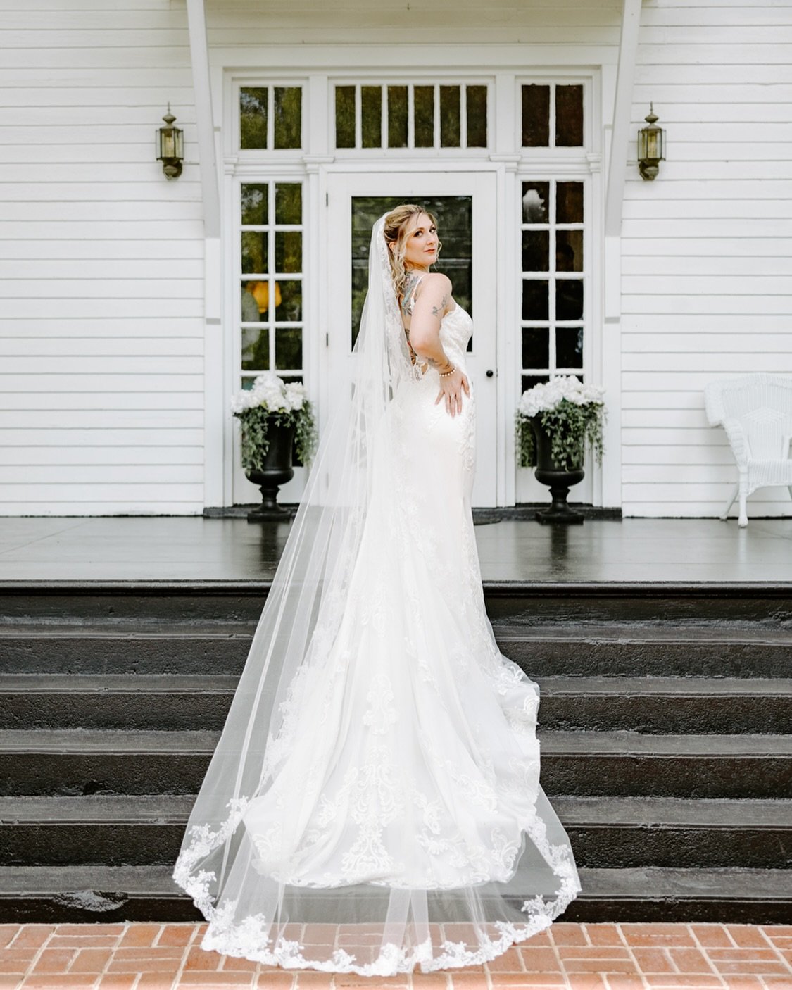 Beautiful Bride on the beautiful porch of @winridgemanor ✨