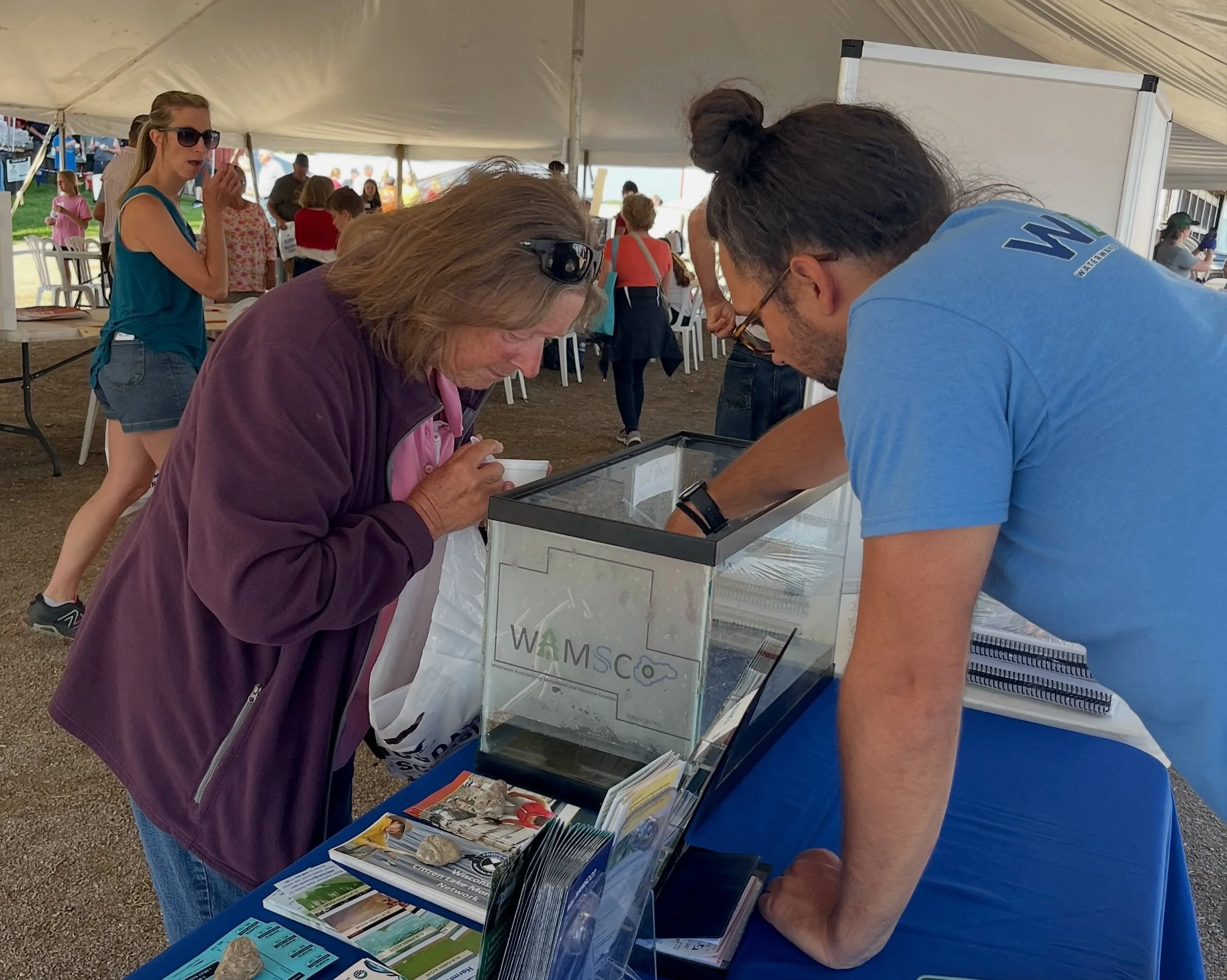 Our aquatic invasive species touch tank and frog flinger game were hits at Shawano County&rsquo;s Brunch on the Farm this year 🐸 

If you missed us, we will be flinging frogs at The Smalley Beach Bash TOMORROW starting at 2!

#frogflinger #smalleybe