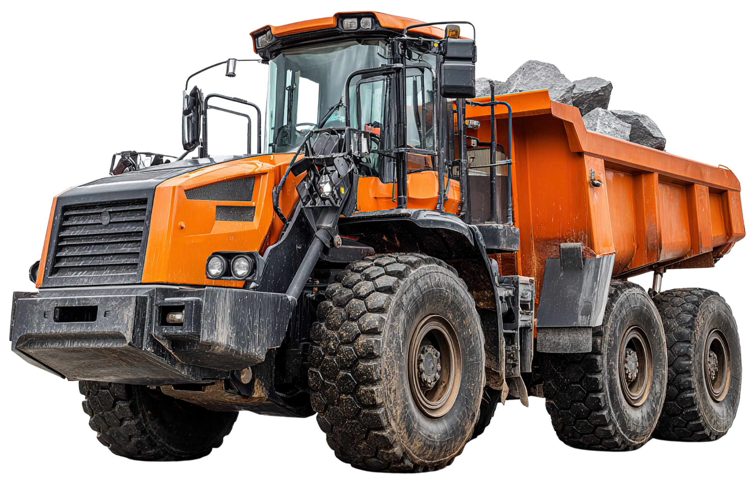 An orange dump truck loaded with rocks, on rough outdoor terrain.