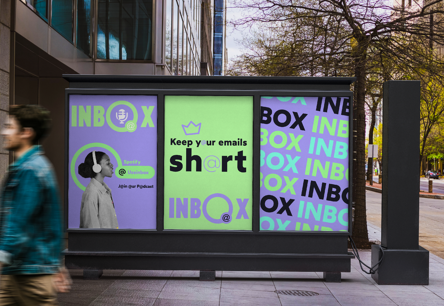 A city bus stop advertisement display with three sections. The left section features a woman with headphones and text promoting Spotify and a podcast. The middle section encourages keeping emails short with a crown icon. The right section displays repeated patterns of the word 'INBOX' in different colors and fonts.