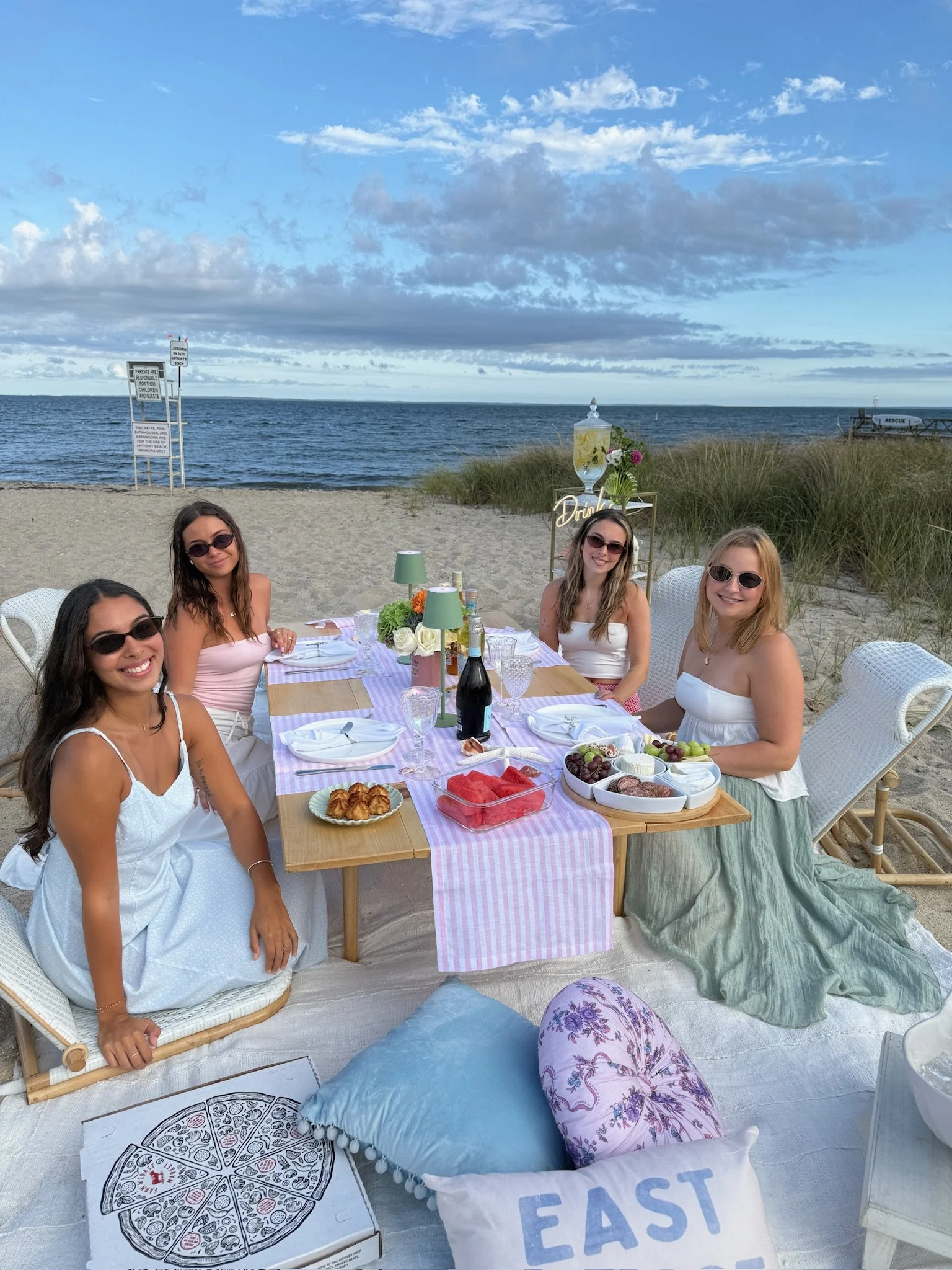 Newport RI bachelorette picnic with pink décor and custom signage
