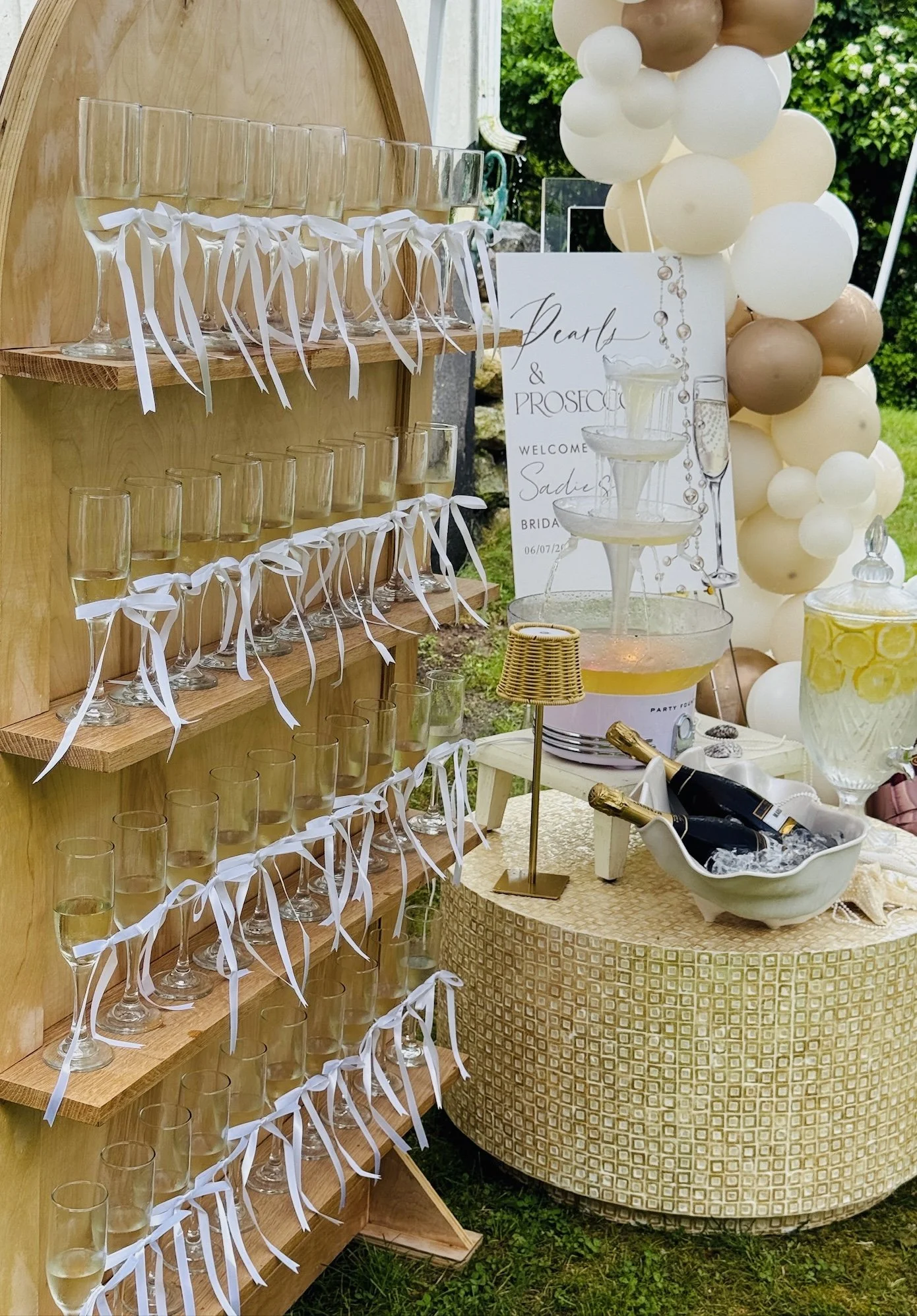 Outdoor bridal shower picnic with charcuterie boards and boho décor