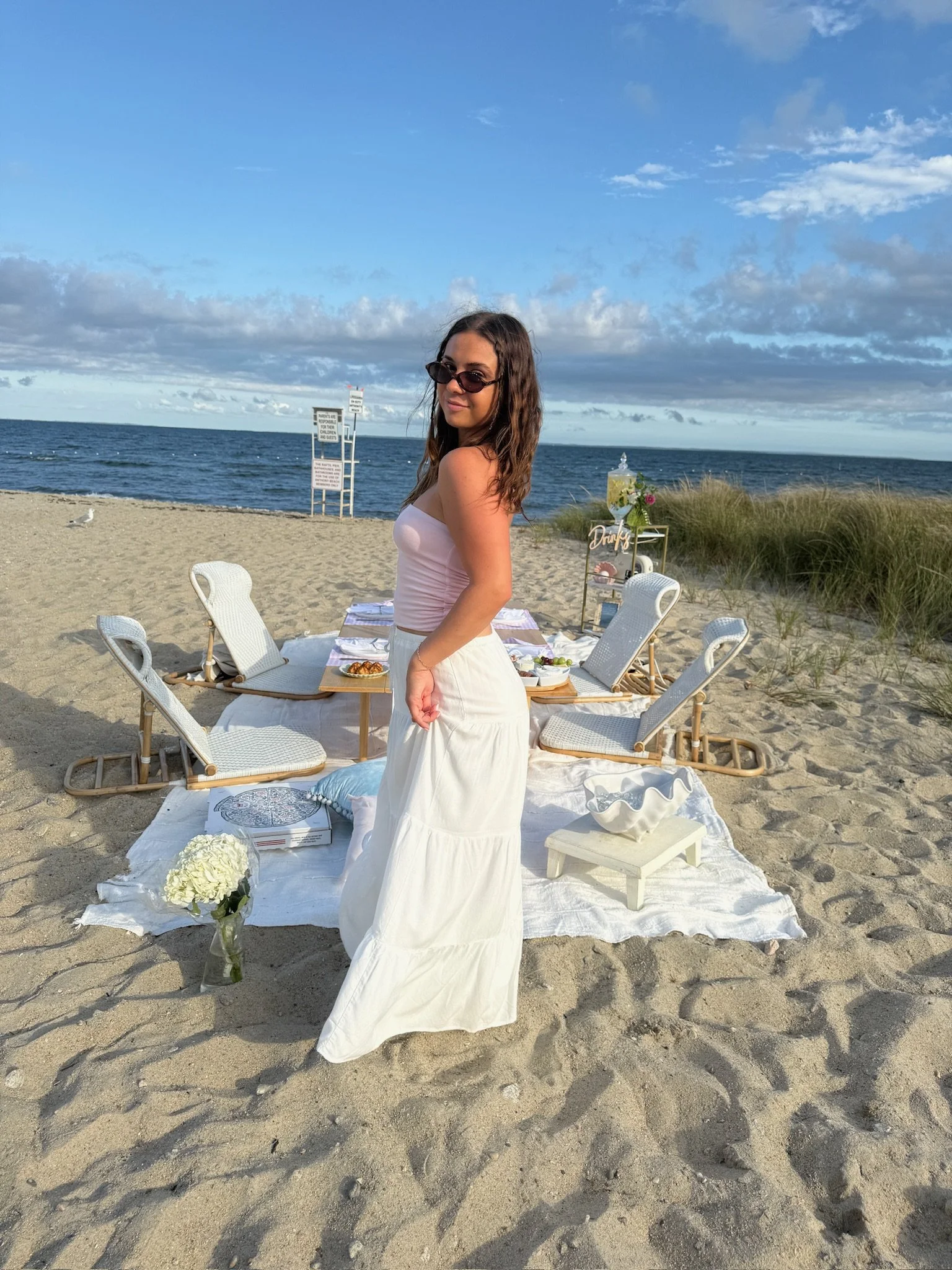 Newport RI bachelorette picnic with pink décor and custom signage