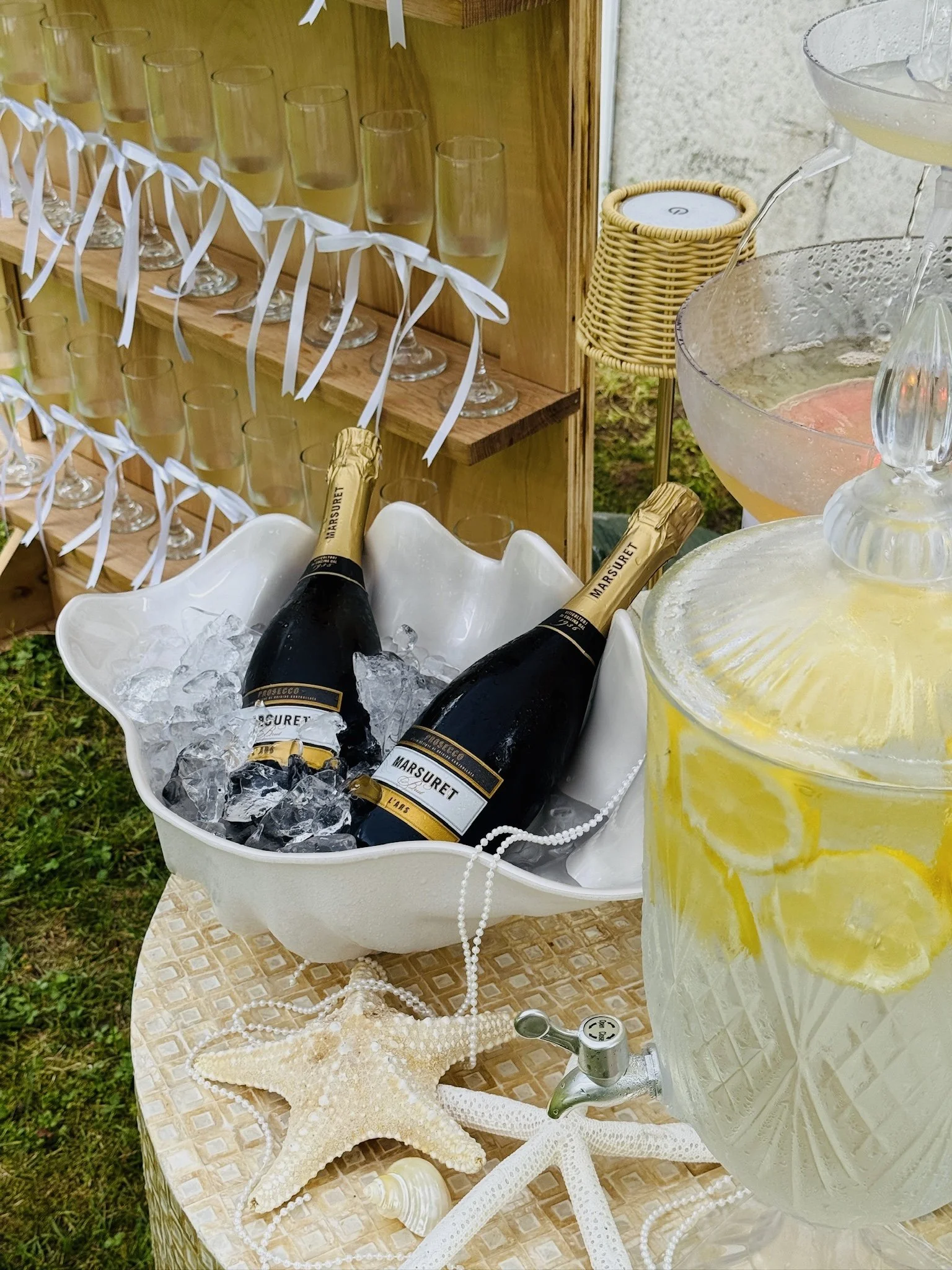 Outdoor bridal shower picnic with charcuterie boards and boho décor