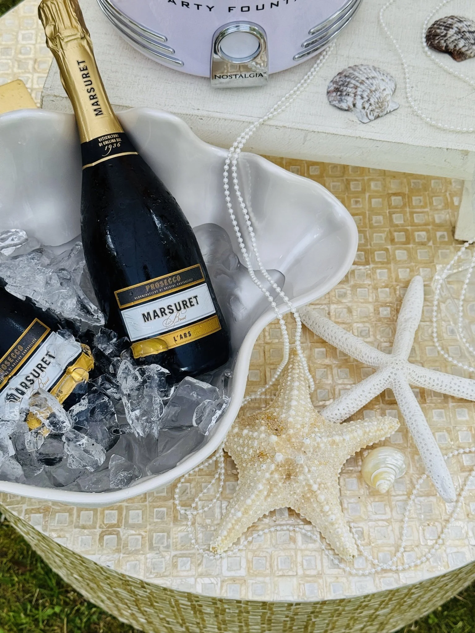 Outdoor bridal shower picnic with charcuterie boards and boho décor