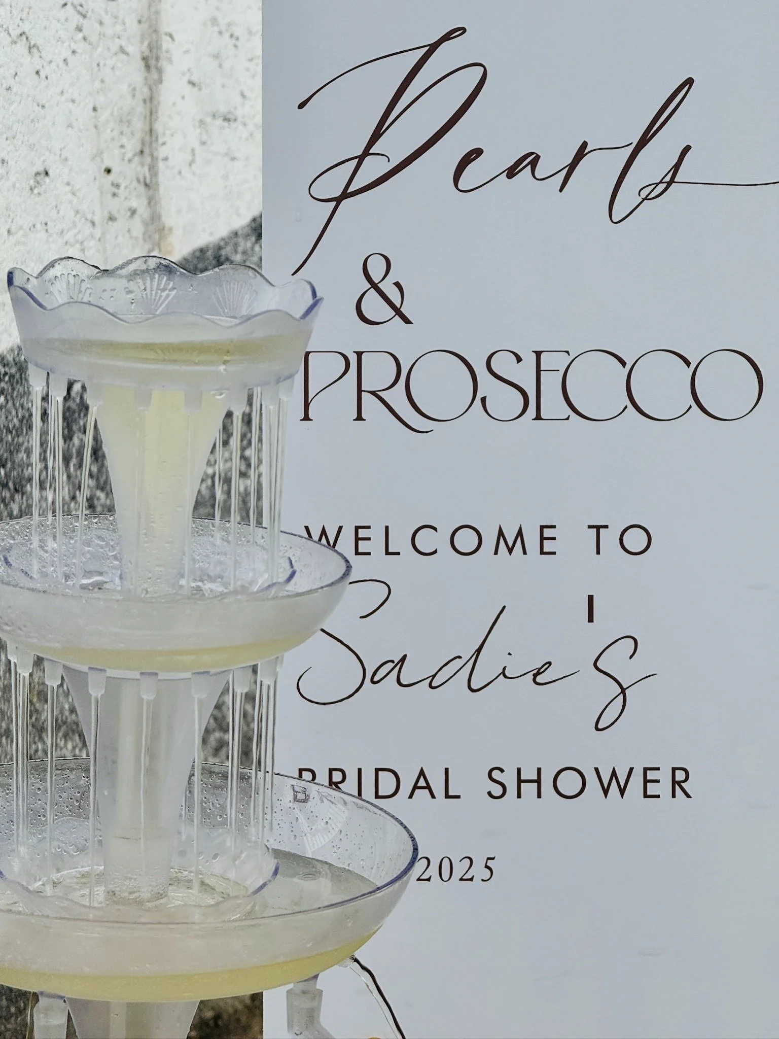 Outdoor bridal shower picnic with charcuterie boards and boho décor