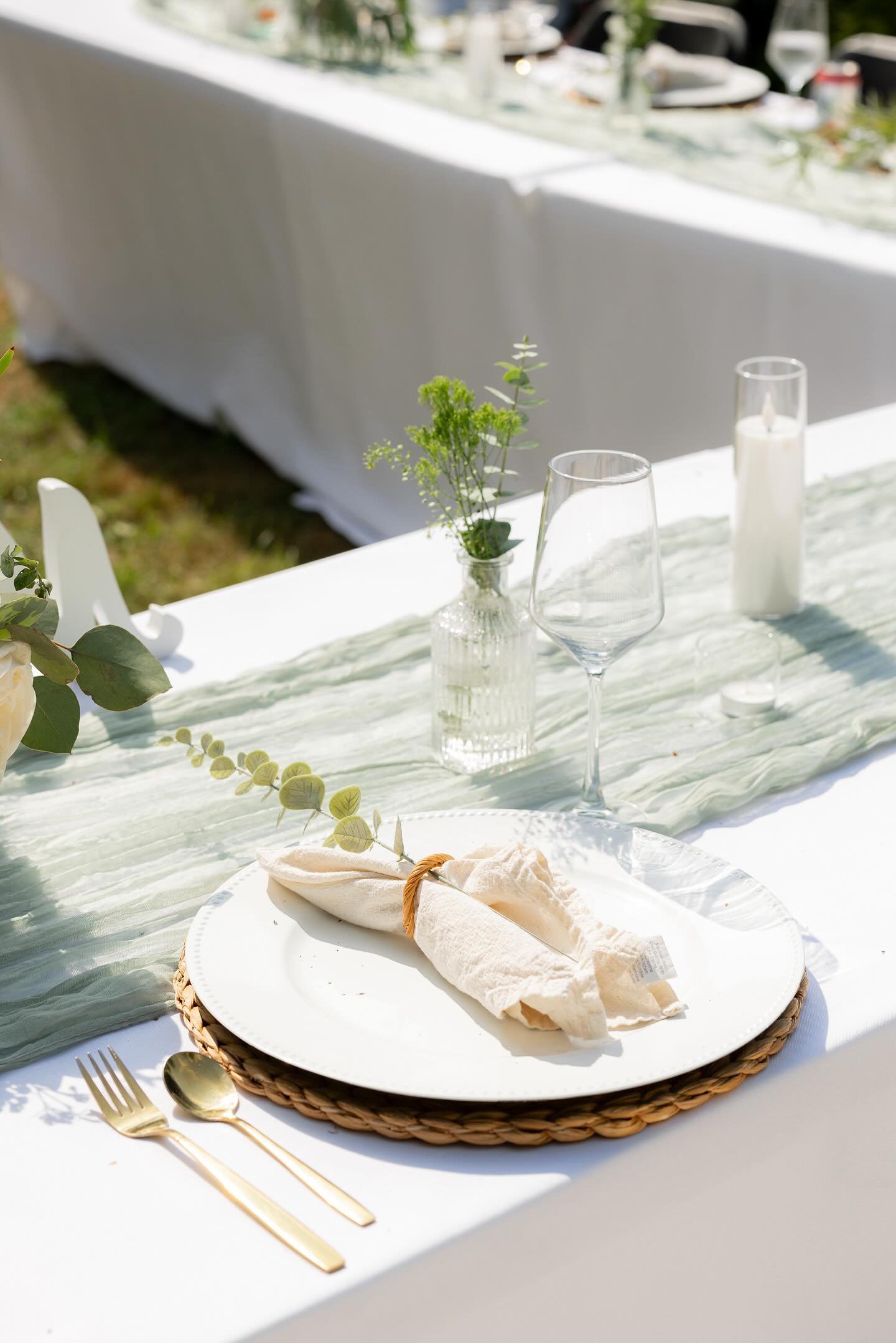 Elegant wedding reception design with soft neutral florals and candlelight