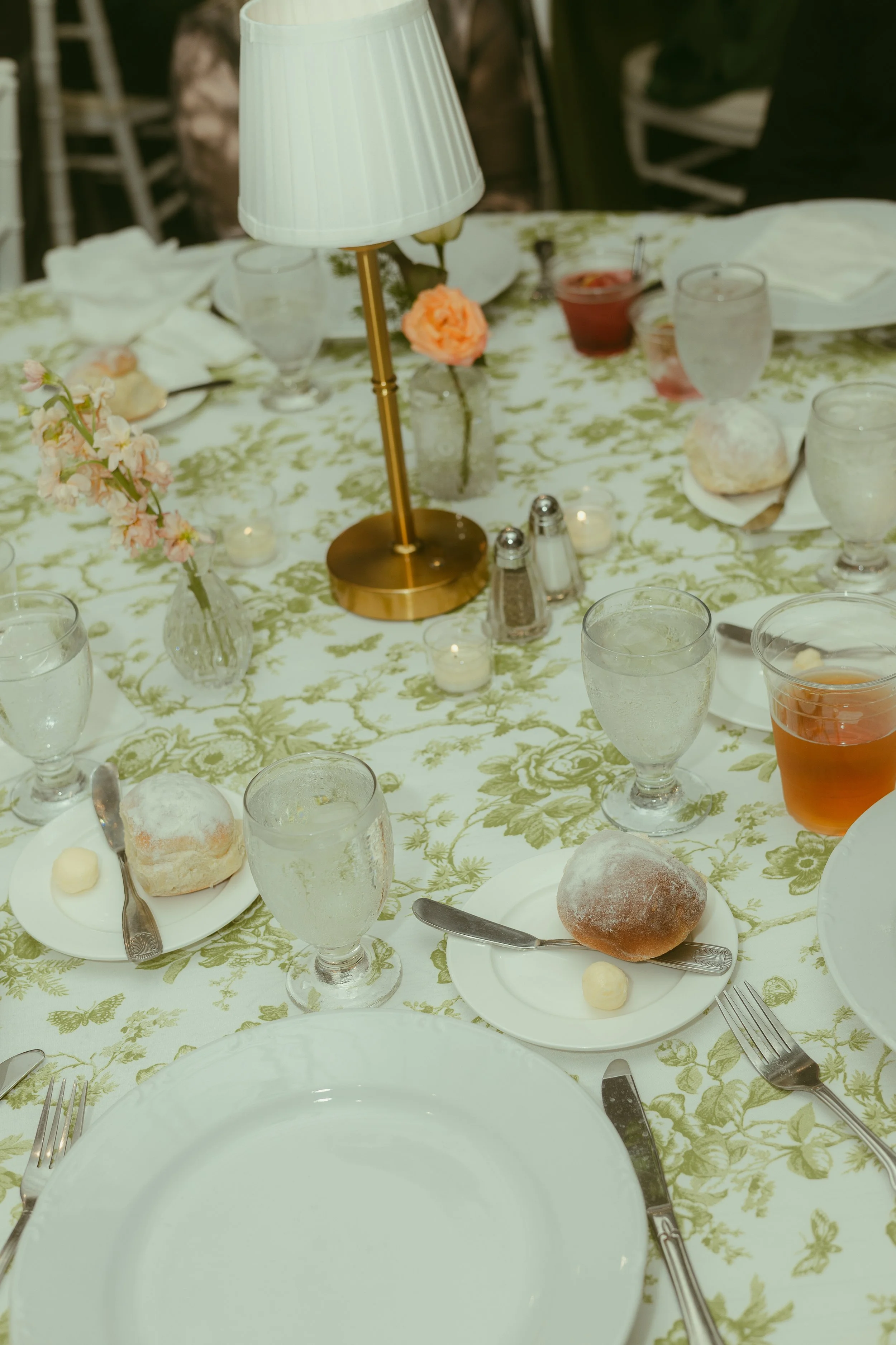 Event planner coordinating reception timeline and vendor setup