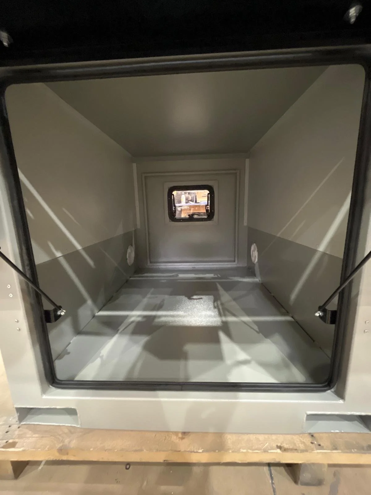 Demountable DEBOXS universal pickup storage system. Featuring integrated roof bars for roof cargo such as ladders, or rooftop tents, this rugged adventure and work canopy replacement offers a non-invasive mounting system that protects vehicle lease r