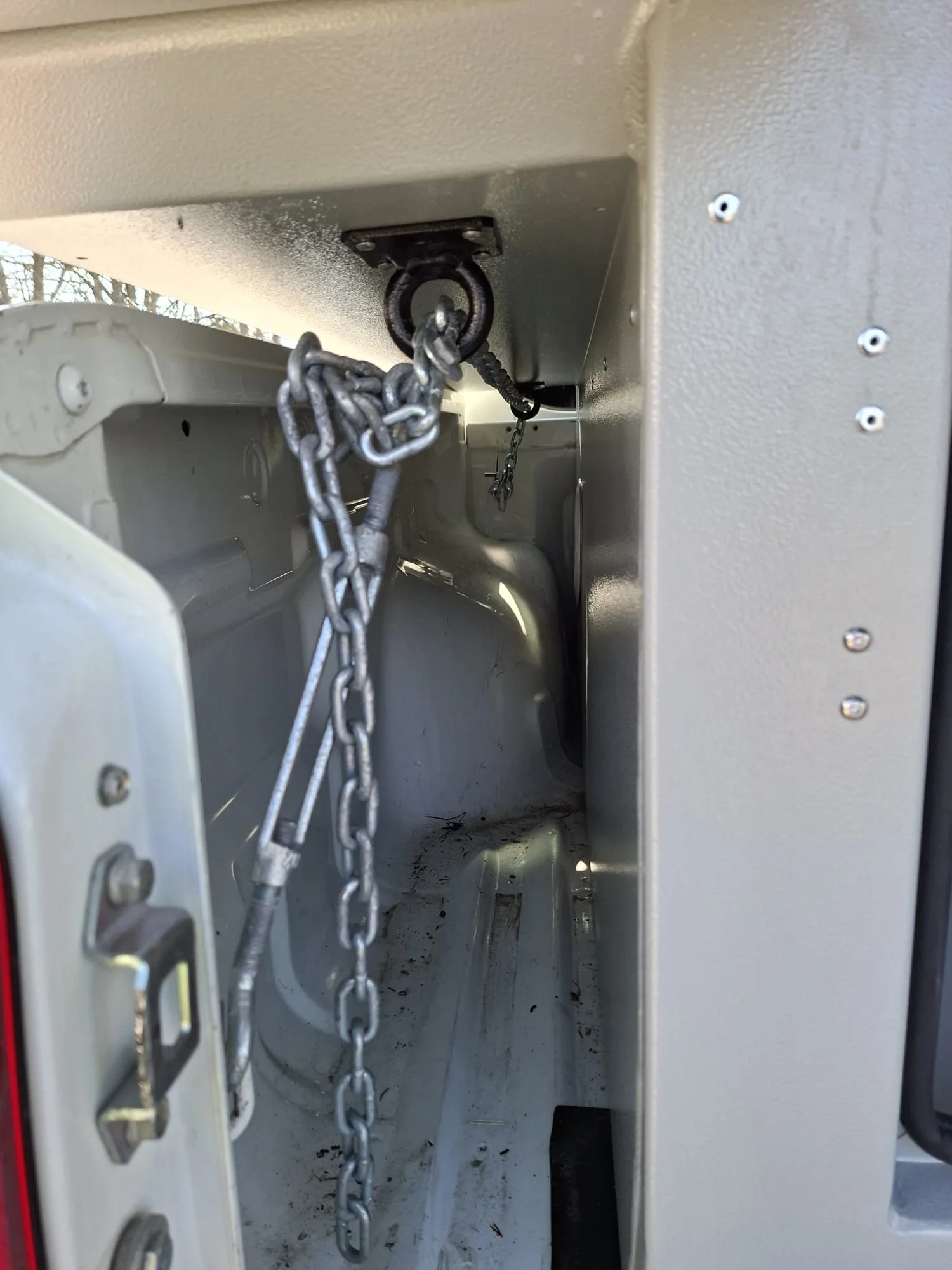 Demountable DEBOXS universal pickup storage system. Featuring integrated roof bars for roof cargo such as ladders, or rooftop tents, this rugged adventure and work canopy replacement offers a non-invasive mounting system that protects vehicle lease r