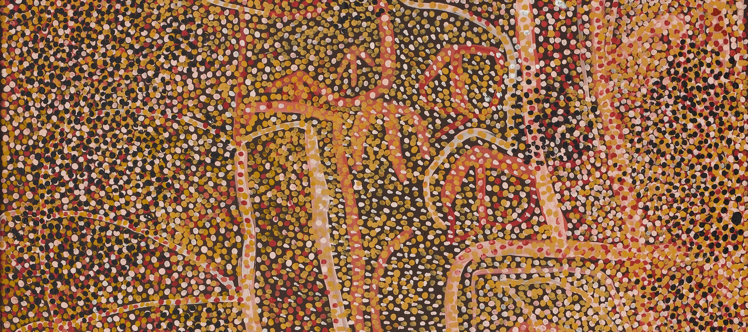 Détail macro d'une peinture aborigène montrant le relief de la touche