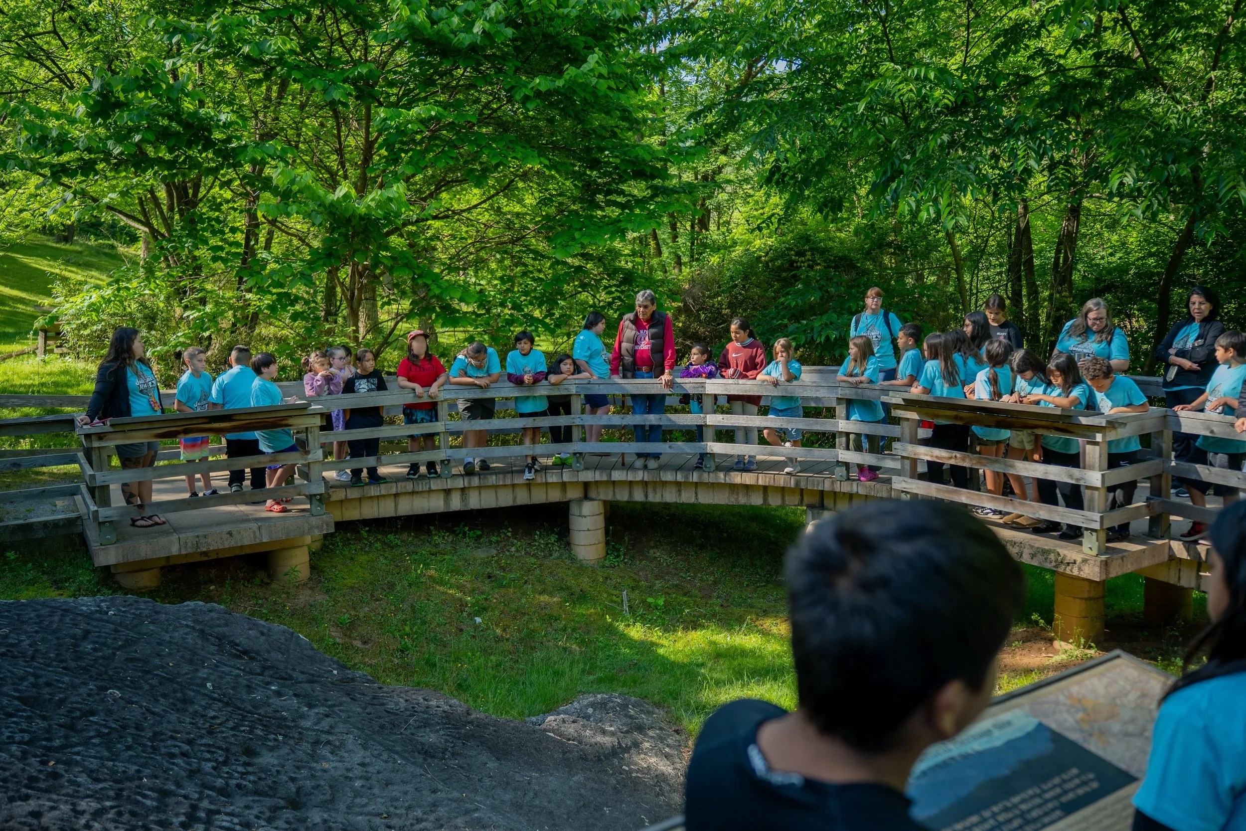 The Judaculla&rsquo;s Kids Conservation Club concluded its program year with a final field trip to Judaculla Rock. Dr. Tom Belt, an Earth Keeper, spoke with students about the importance of place and carrying Cherokee stories forward through action a
