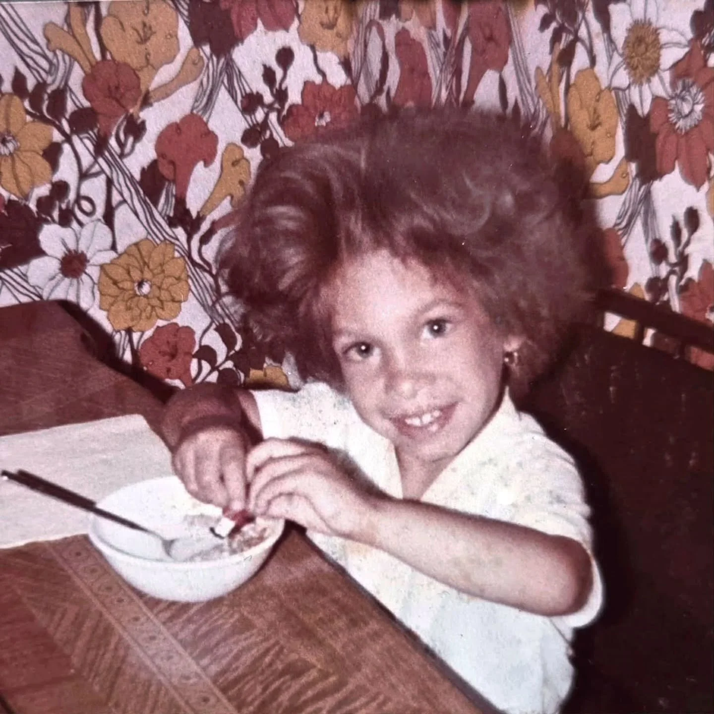 Big Hair I Don't Care!
I was four years old in this picture. Enjoying my breakfast while dunking my toys in it. Dreaming of silly things, adventures to come, and what I would play with that day. 
Nothing says mornings like a good bed head. 
And 70