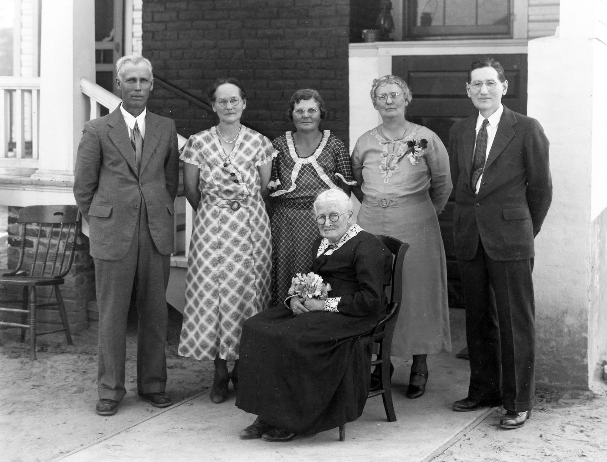 Sallie Newman Holland and children - Herbert H. Holland, Florence H. Holland (m. Bob Wagner), Maggie Holland (m. “Bud” Holland), Eva H. Wagner (m. Ed Wagner), and Richard Holland. Taken at their home on Milner’s Road. The home was later the location