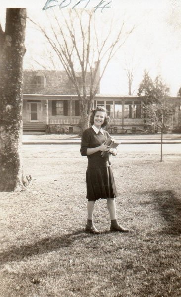 copy_0_edith-hurff-in-front-yard-with-saunders-house-in-background