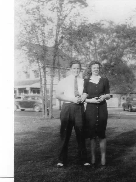 P.D. Howell and Addie Rawls Moore in Johnson's front yard.