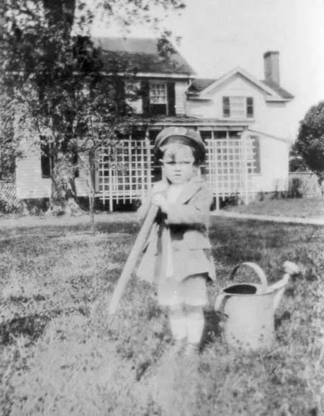  Tucker Pinner in front of Pinner house in 1927. Pinner house is located above the Chuckatuck grist mill. 