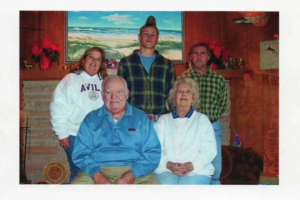  Date -  Rear: Cheryl Johnson, Charles Cleveland (C.C.) Johnson IV and Charles Cleveland (Cleve) Johnson, III  Front: Charles Cleveland Johnson, Jr. and Ann Staylor Johnson  Johnson family photo 