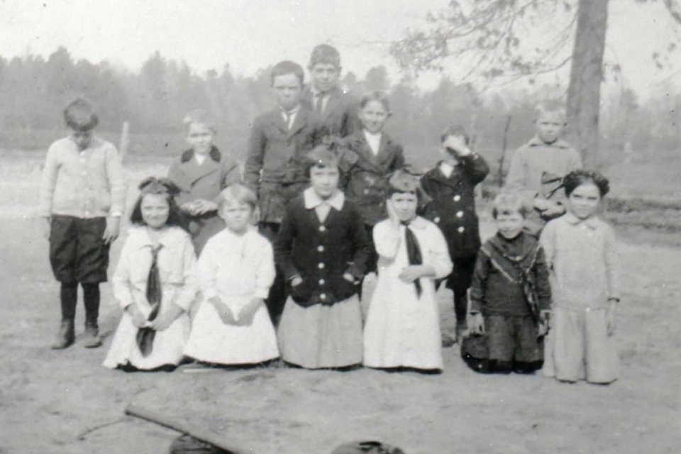 Students at Everets School, c1914 Front row: second-Evelyn Saunders, sixth-Peggy Pruden Back row-2nd- W. G. Saunders, Jr., 3rd - ? Pruden One boy was brother to Ruby Edwards Qwaltney and another was thought to be Jacobson Pruden W.G. Saunders fam