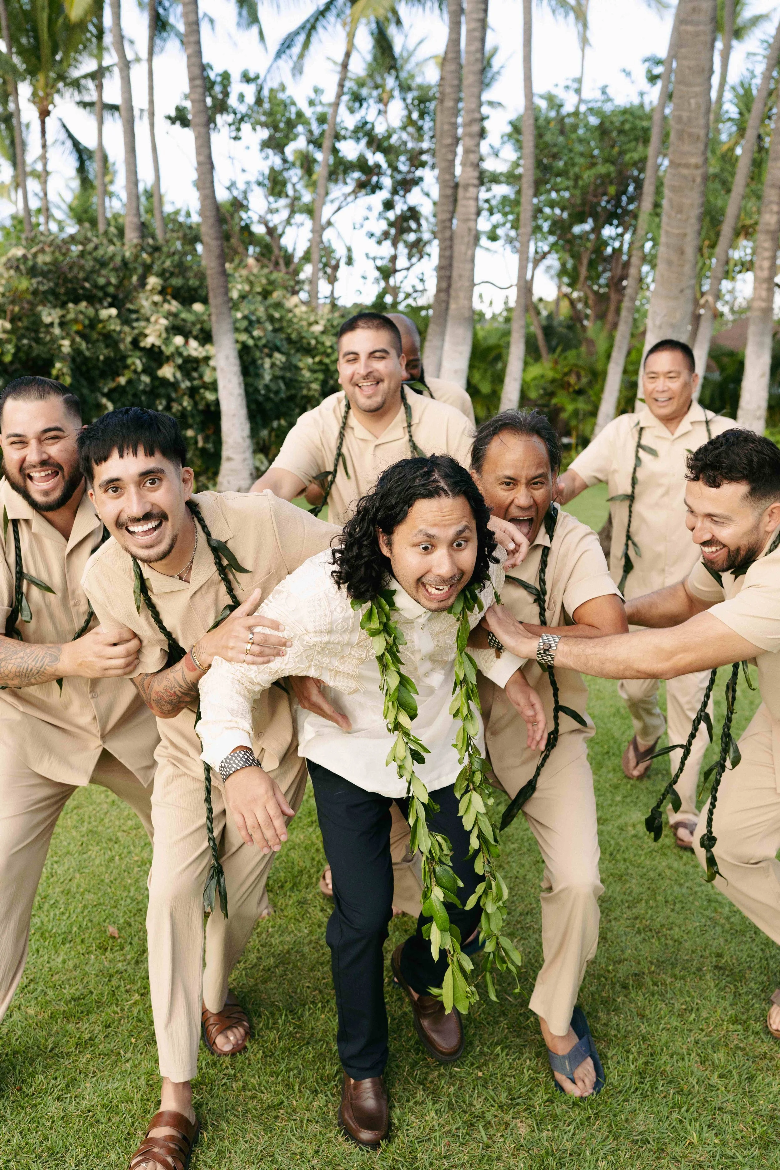 wedding party celebrating at Lanikuhonua Ko Olina Oahu Hawaii.