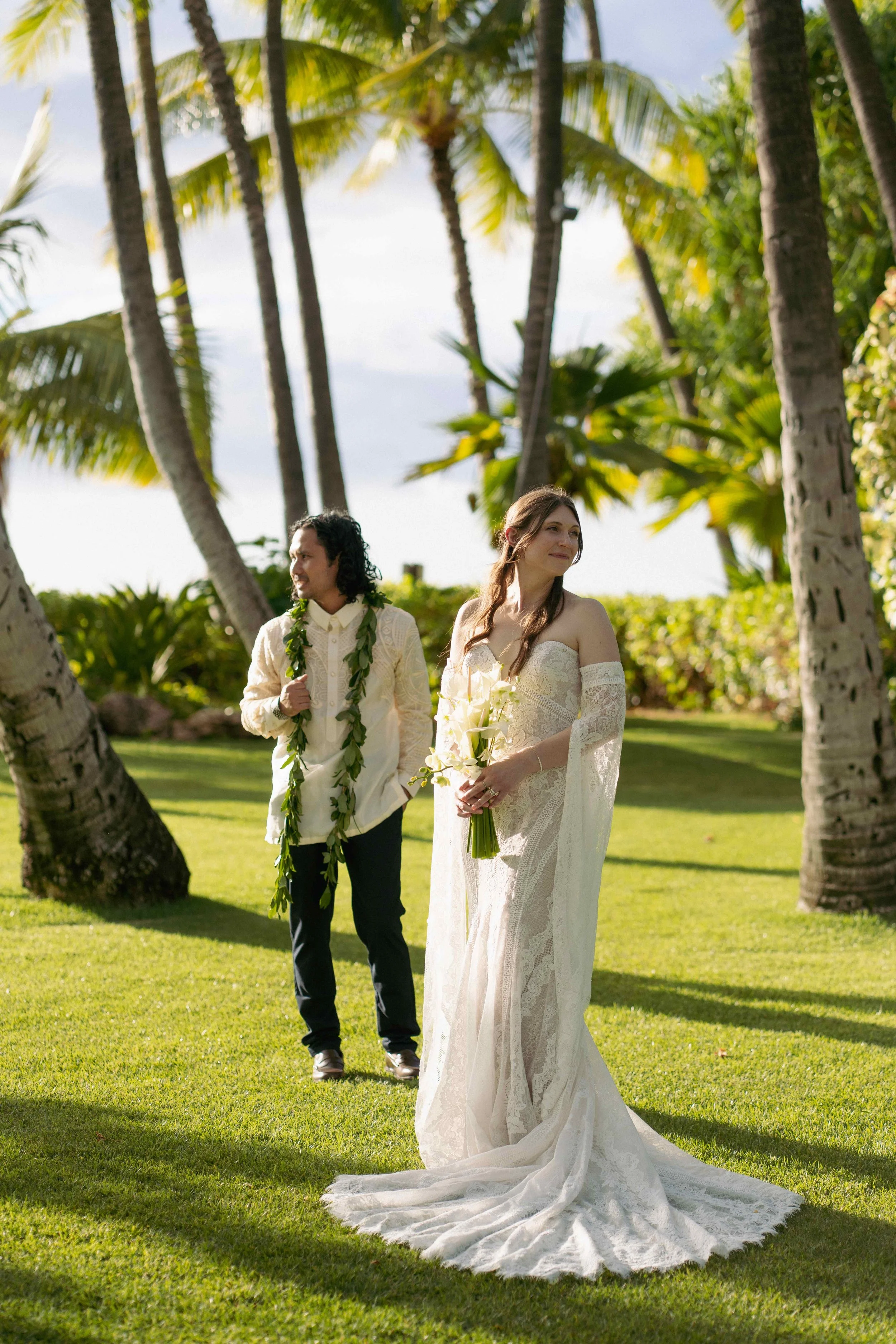 Bride and groom outdoor ceremony at Lanikuhonua Ko Olina Oahu Hawaii.