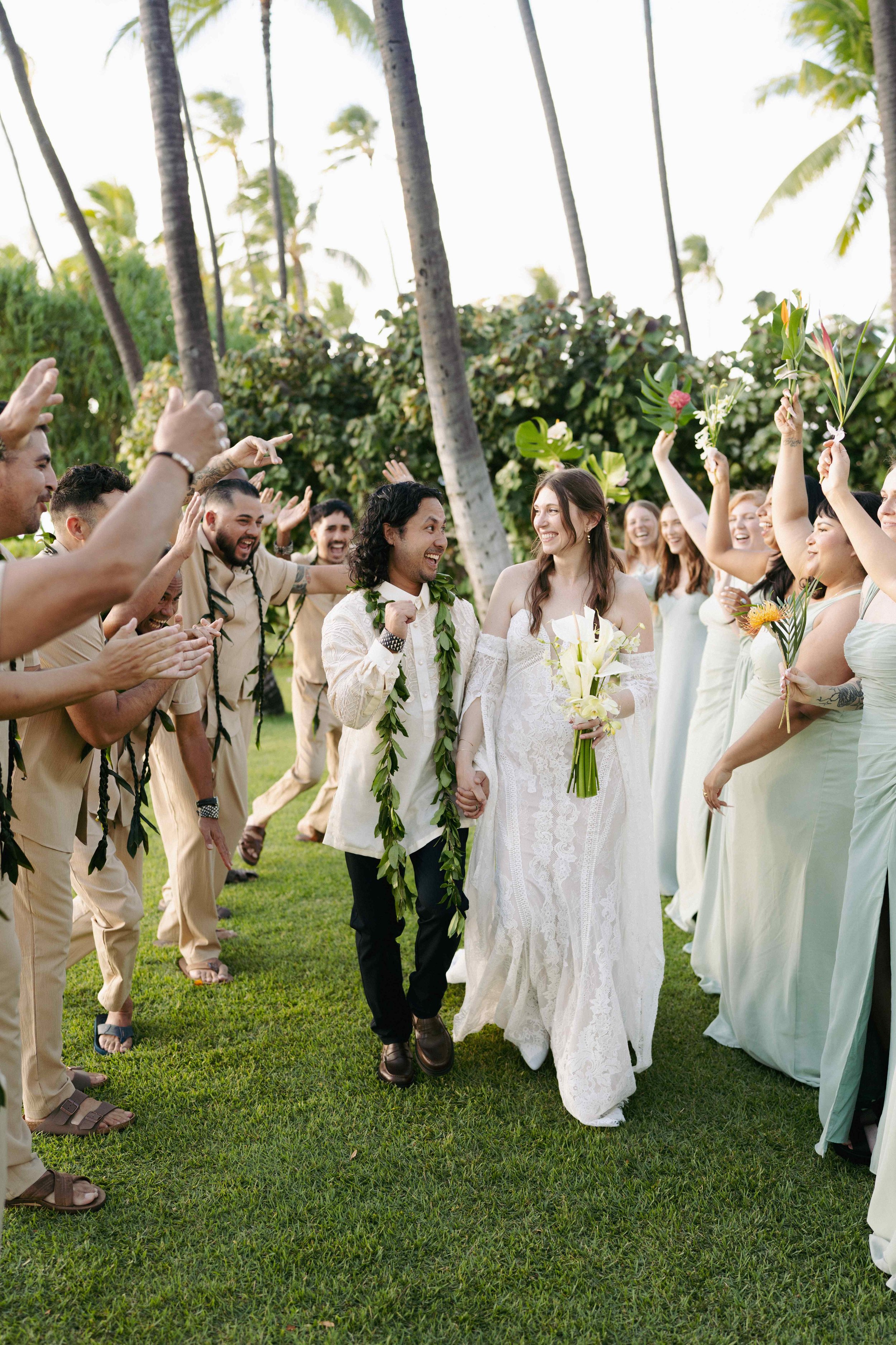 wedding party celebrating at Lanikuhonua Ko Olina Oahu Hawaii.