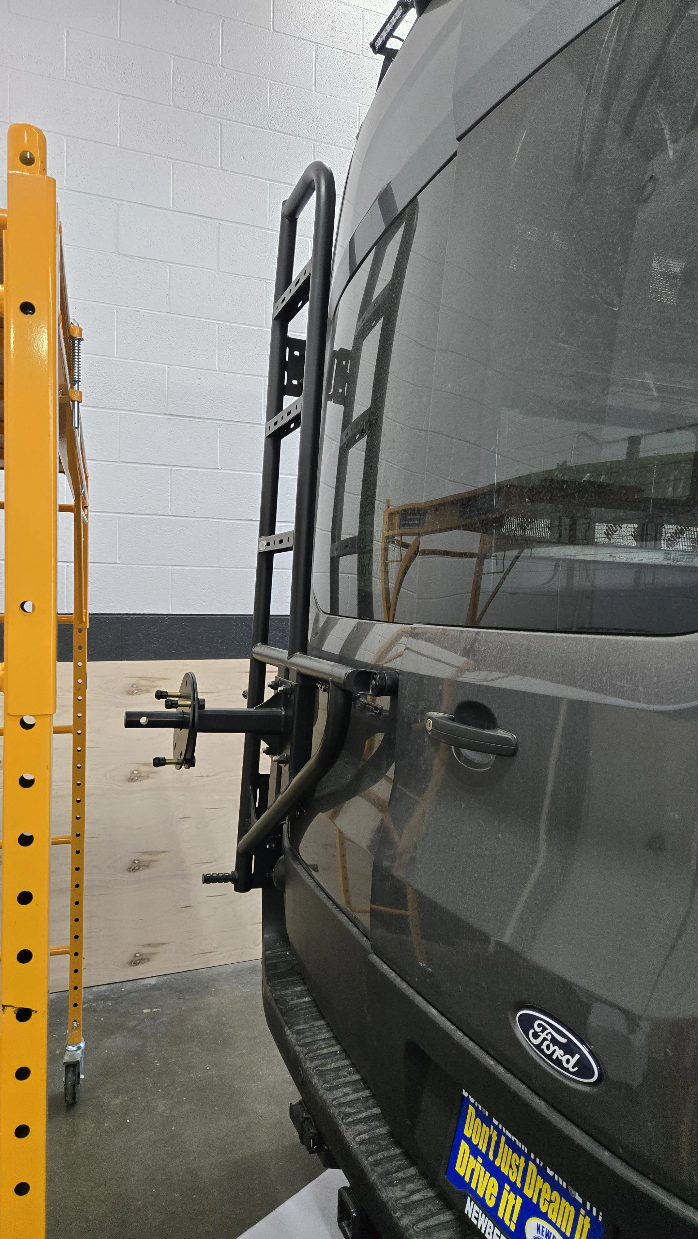 Why We Install Rear Tire Carriers on our Camper Van Conversions