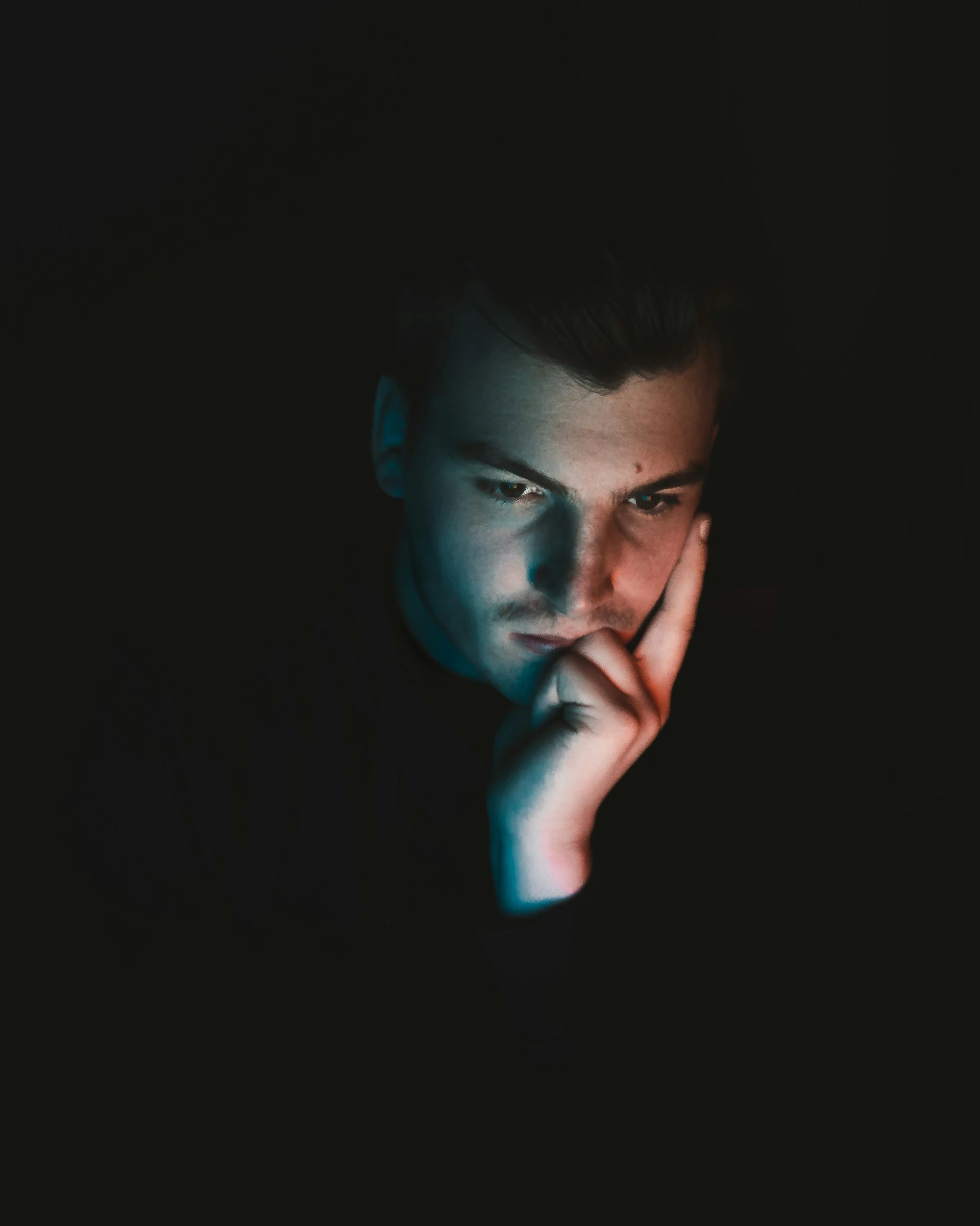 A man with autism who ruminates due to neurobiological differences that make him hyper-focused, cognitively inflexible, and frequently worried about himself