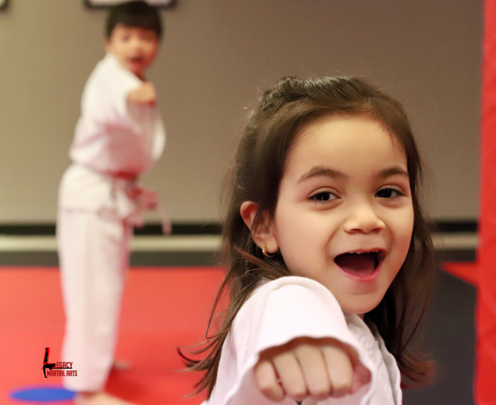Young girl practicing martial arts in a class at Legacy Martial Arts Silver Spring MD