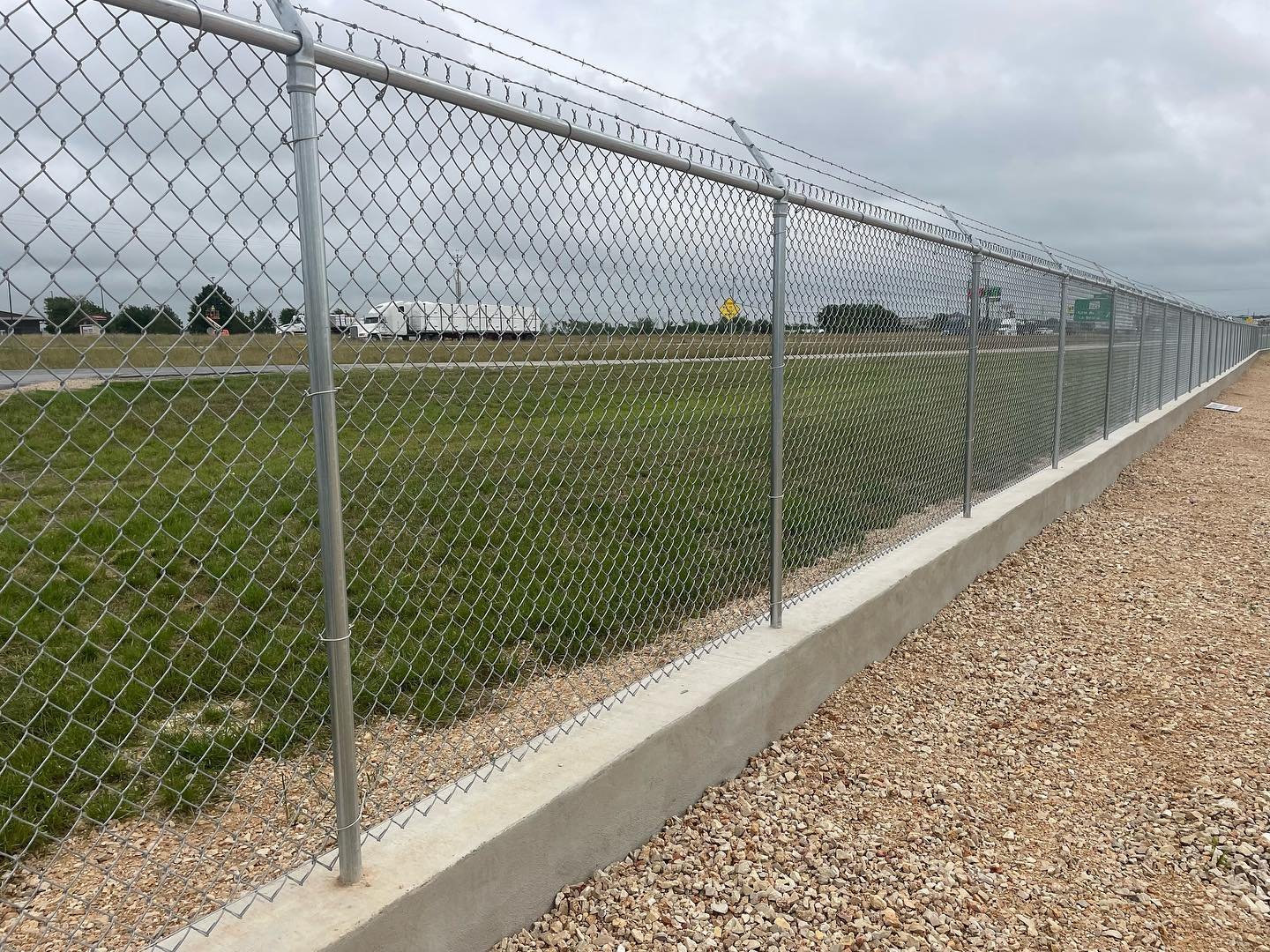 #chainlinkfence #mowstrip #barbwire #commercialfence