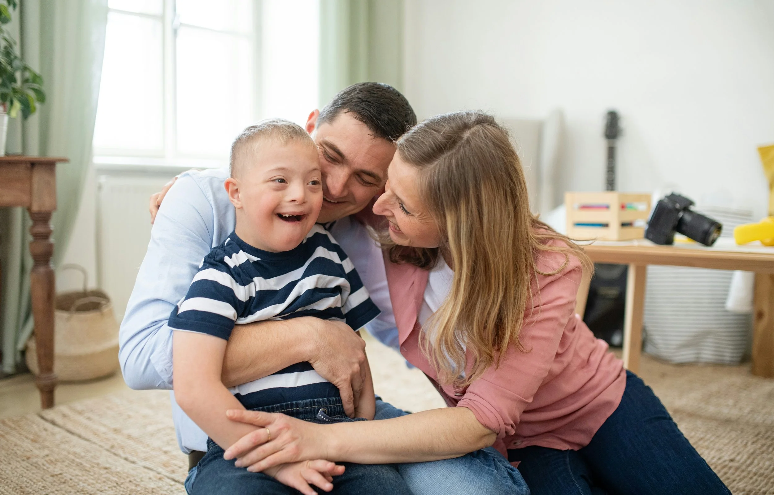 Parents with a special needs child in Houston are working together, connected by a strong bond, because of support received at Heights Couples Therapy.