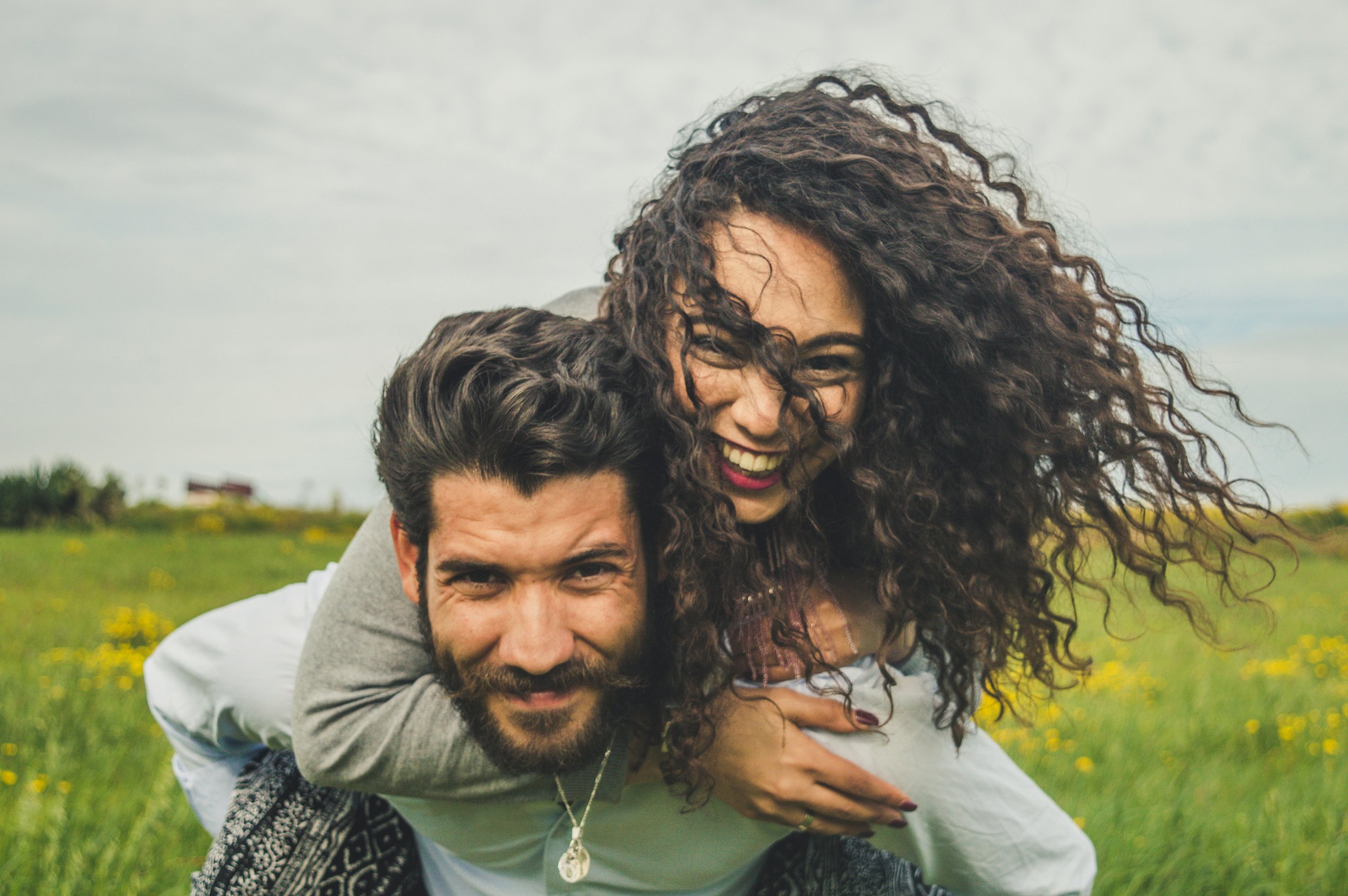 A happy couple is on one of their "eight dates" as part of their self-guided premarital preparation provided by Heights Couples Therapy in Houson.