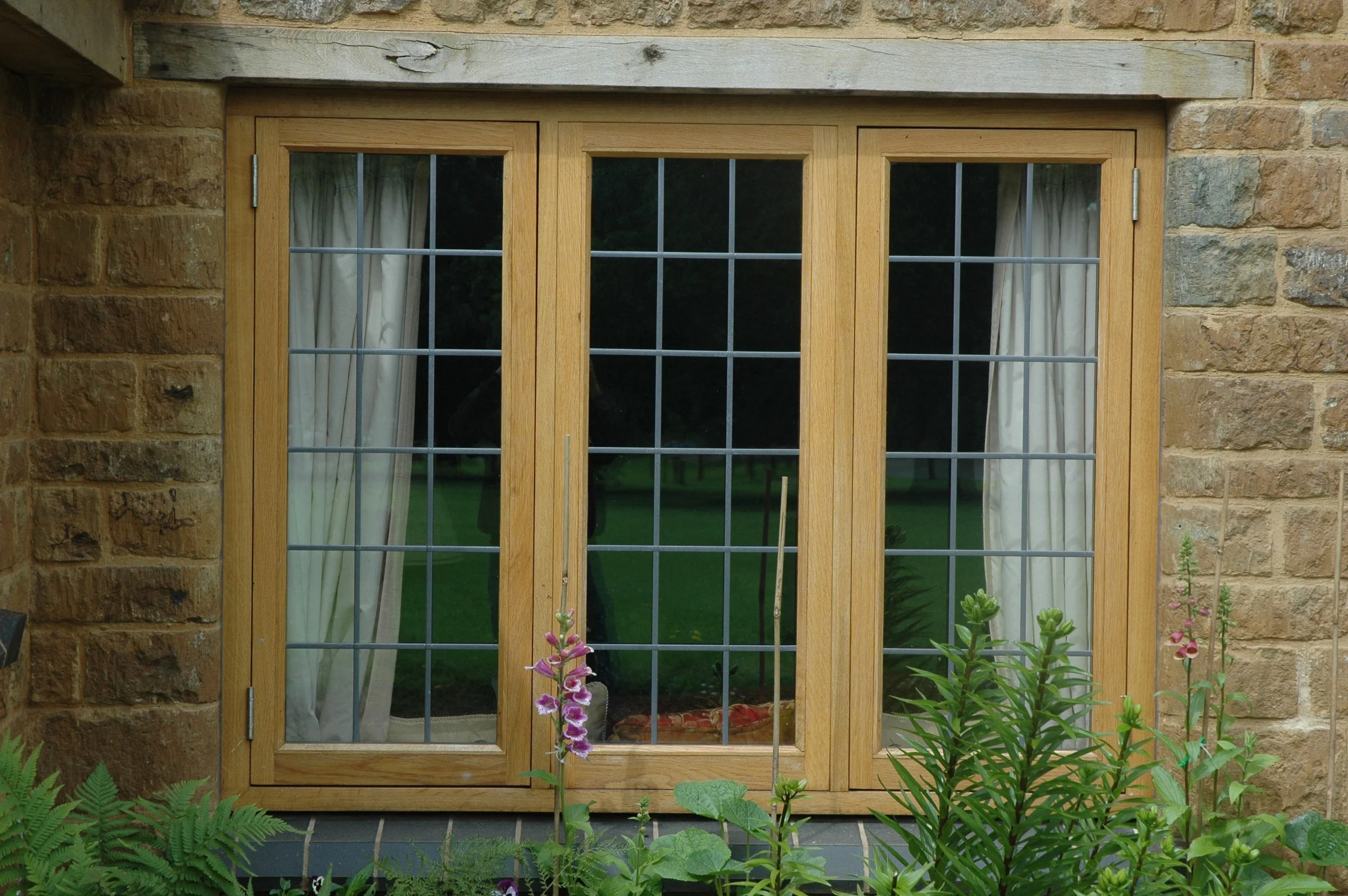 tradition oak window with laid lead glass