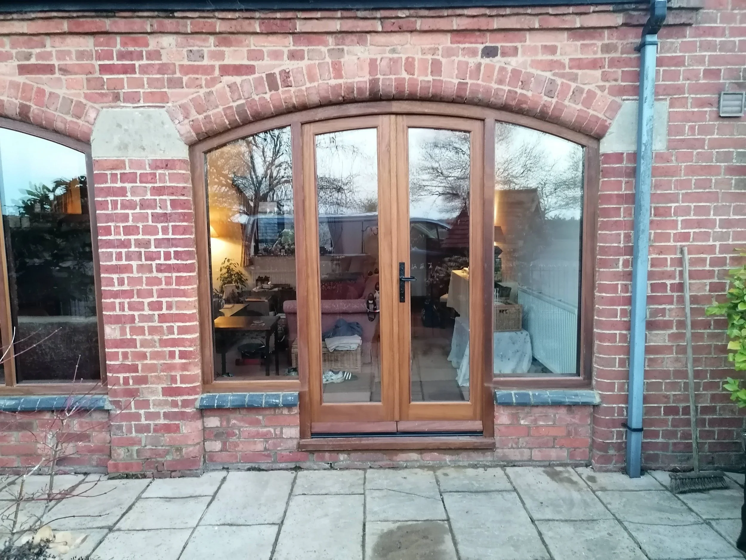 hardwood iroko French door screen with double glazing, multipoint lock, stain in light oak