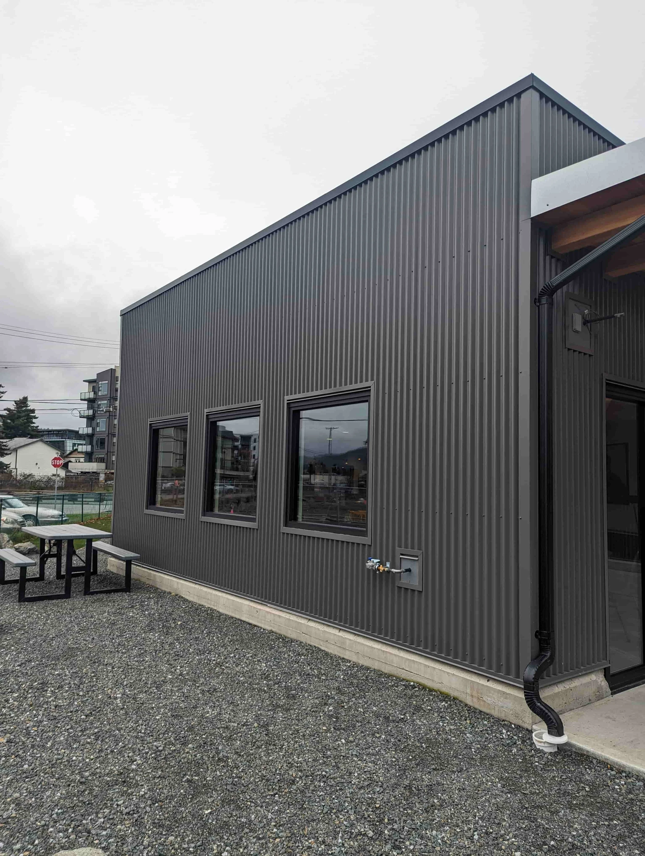Black corrugated siding on Victoria, BC building. 