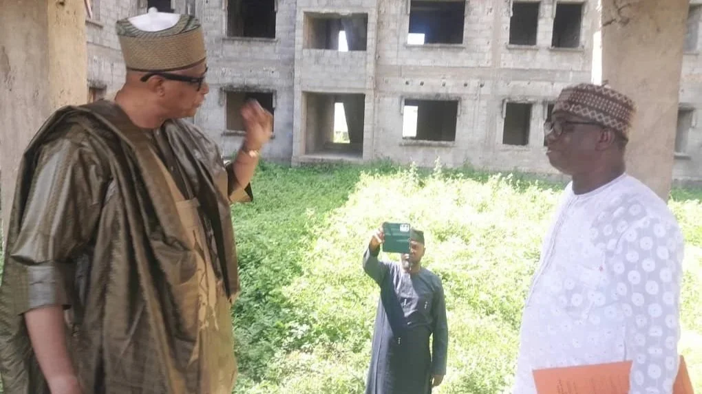 Darma-inspects-an-abandoned-housing-project.